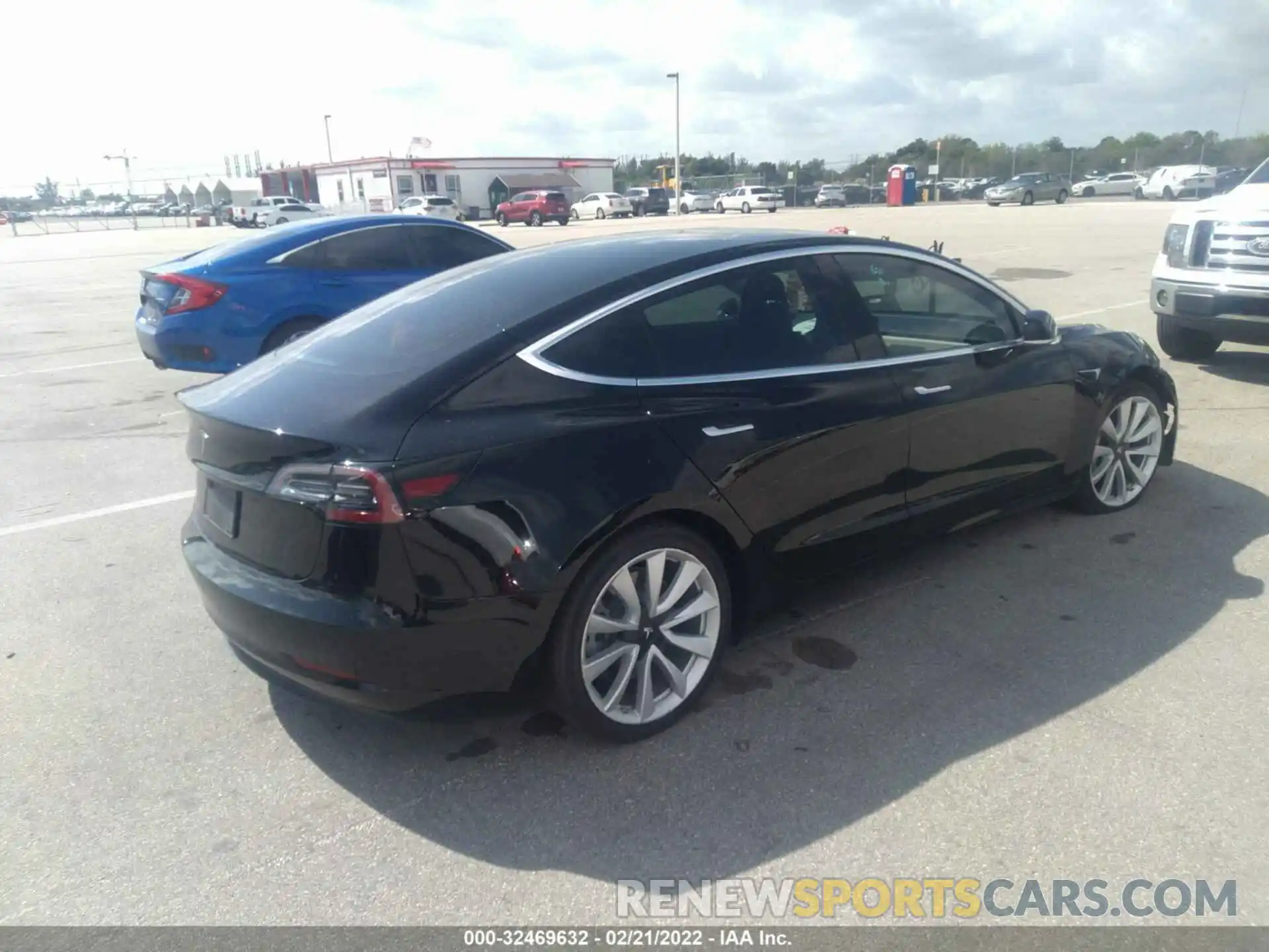 4 Photograph of a damaged car 5YJ3E1EA0LF737906 TESLA MODEL 3 2020