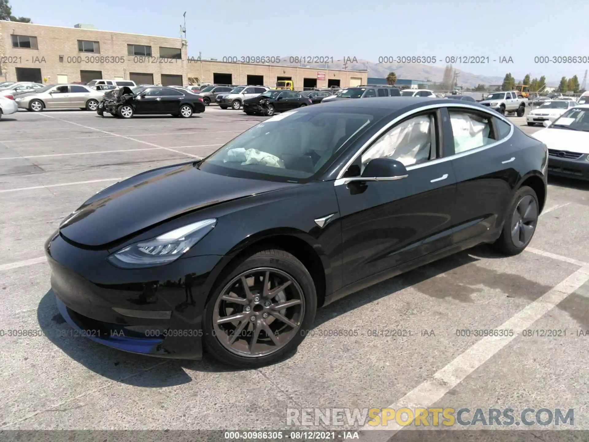 2 Photograph of a damaged car 5YJ3E1EA0LF745682 TESLA MODEL 3 2020