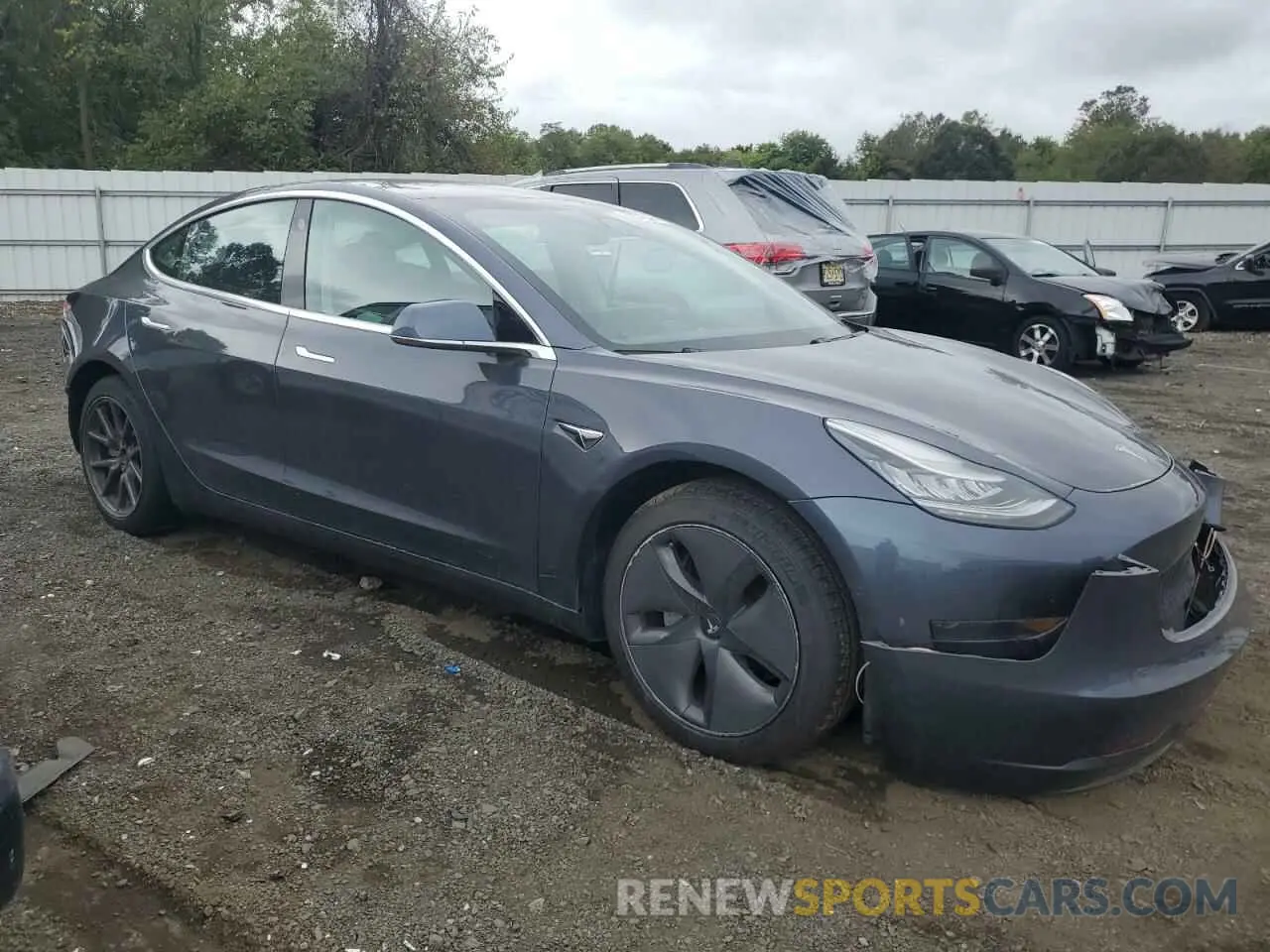 4 Photograph of a damaged car 5YJ3E1EA0LF784840 TESLA MODEL 3 2020