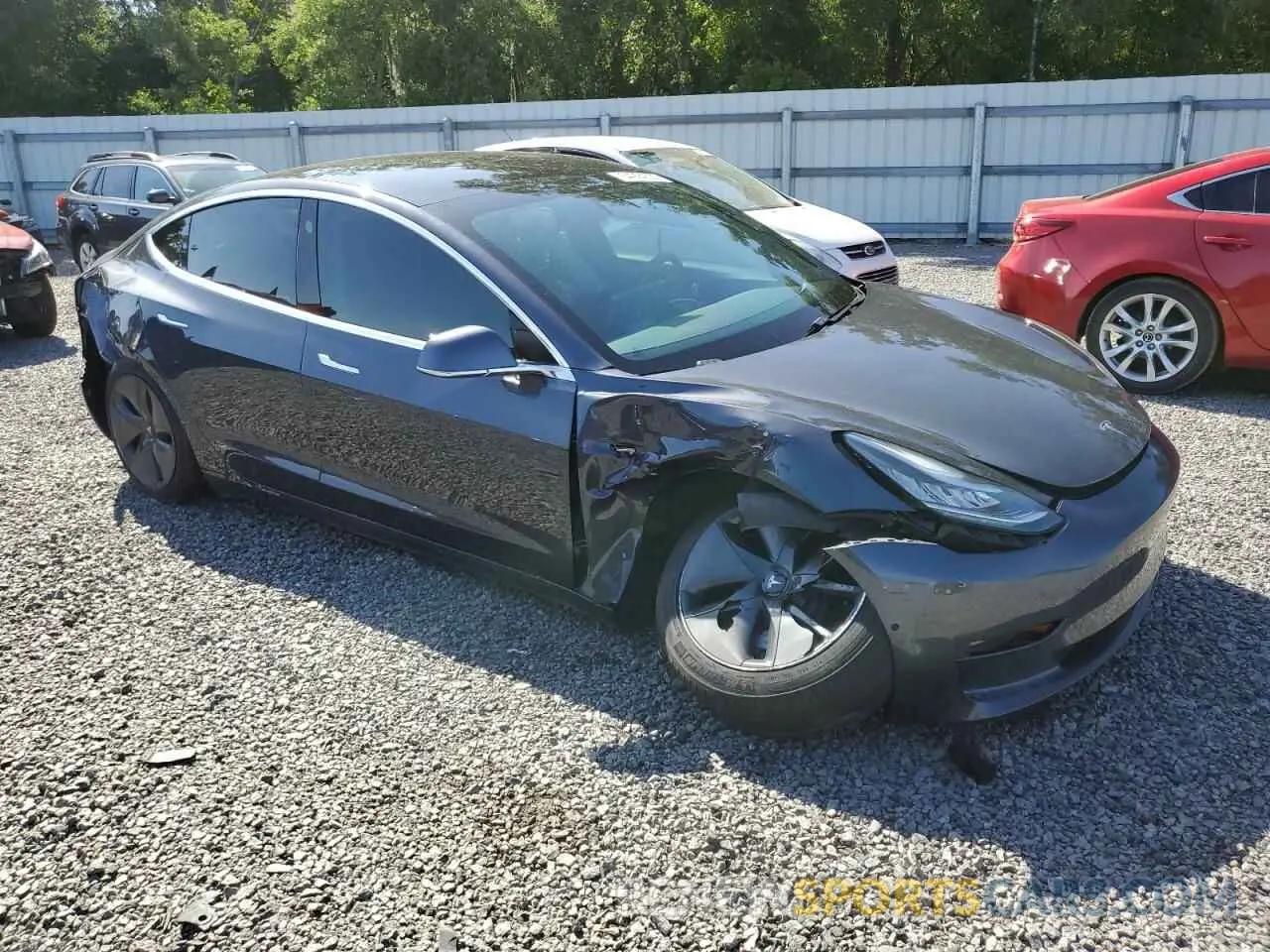 4 Photograph of a damaged car 5YJ3E1EA0LF784854 TESLA MODEL 3 2020