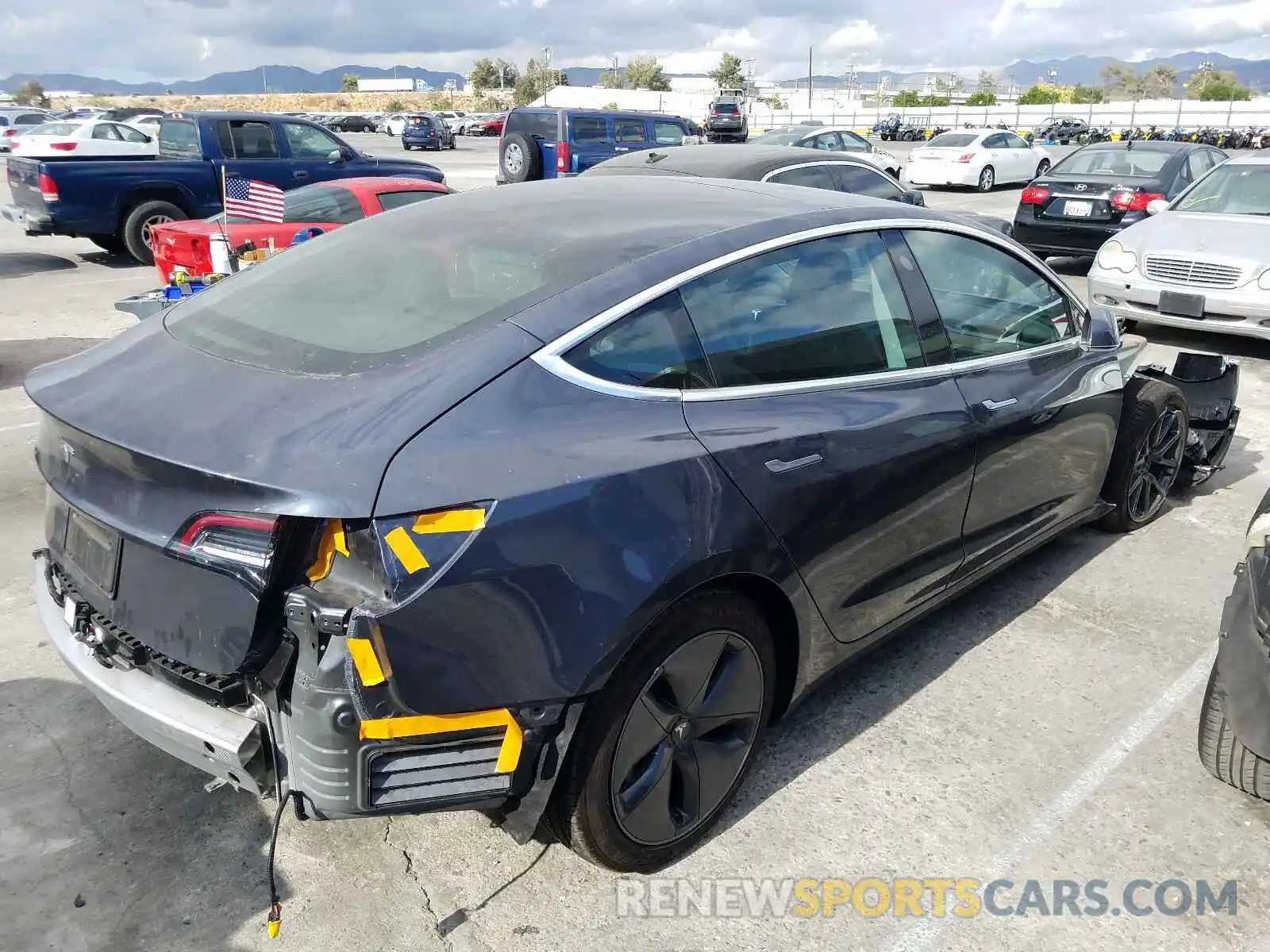 4 Photograph of a damaged car 5YJ3E1EA0LF799192 TESLA MODEL 3 2020