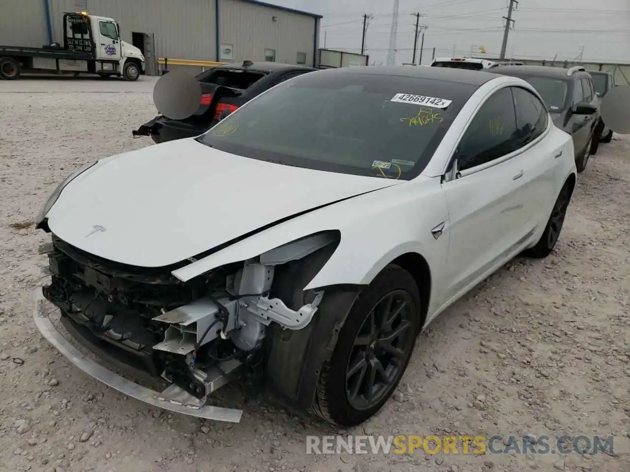 2 Photograph of a damaged car 5YJ3E1EA0LF799645 TESLA MODEL 3 2020