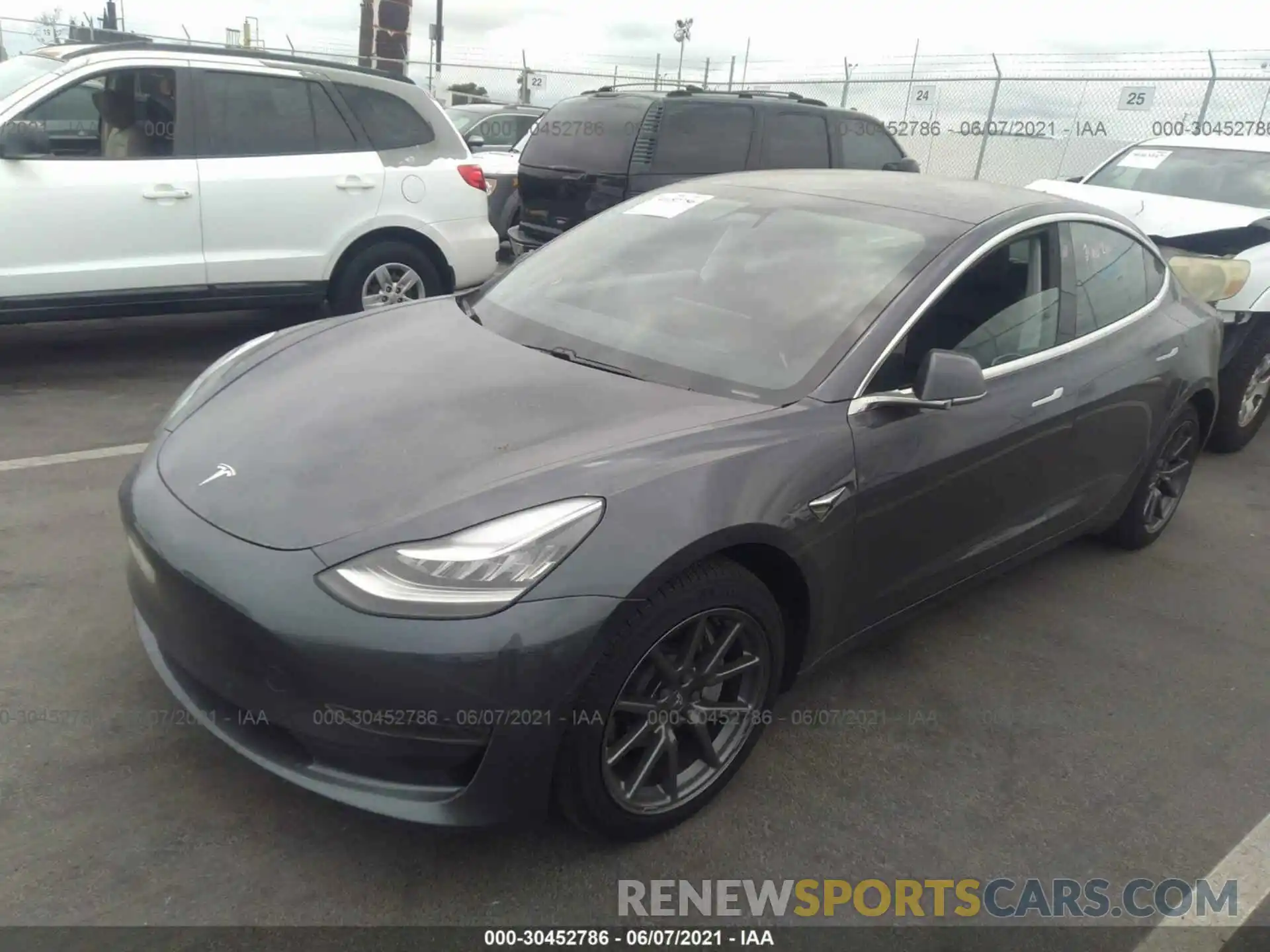 2 Photograph of a damaged car 5YJ3E1EA0LF803595 TESLA MODEL 3 2020