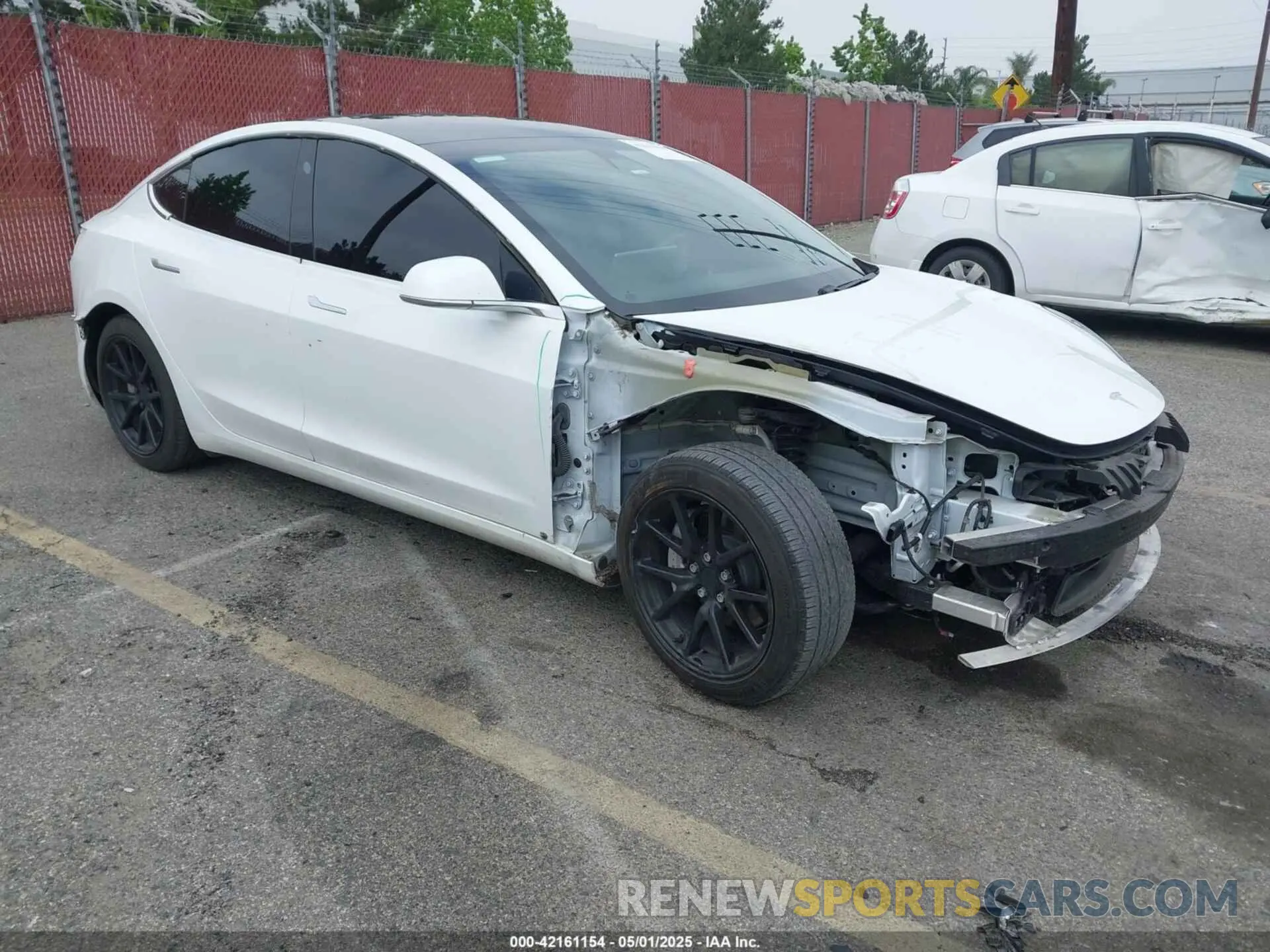 1 Photograph of a damaged car 5YJ3E1EA0LF803984 TESLA MODEL 3 2020