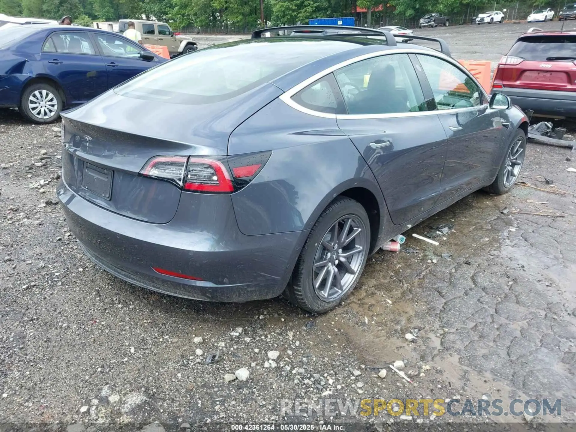 4 Photograph of a damaged car 5YJ3E1EA1LF597221 TESLA MODEL 3 2020