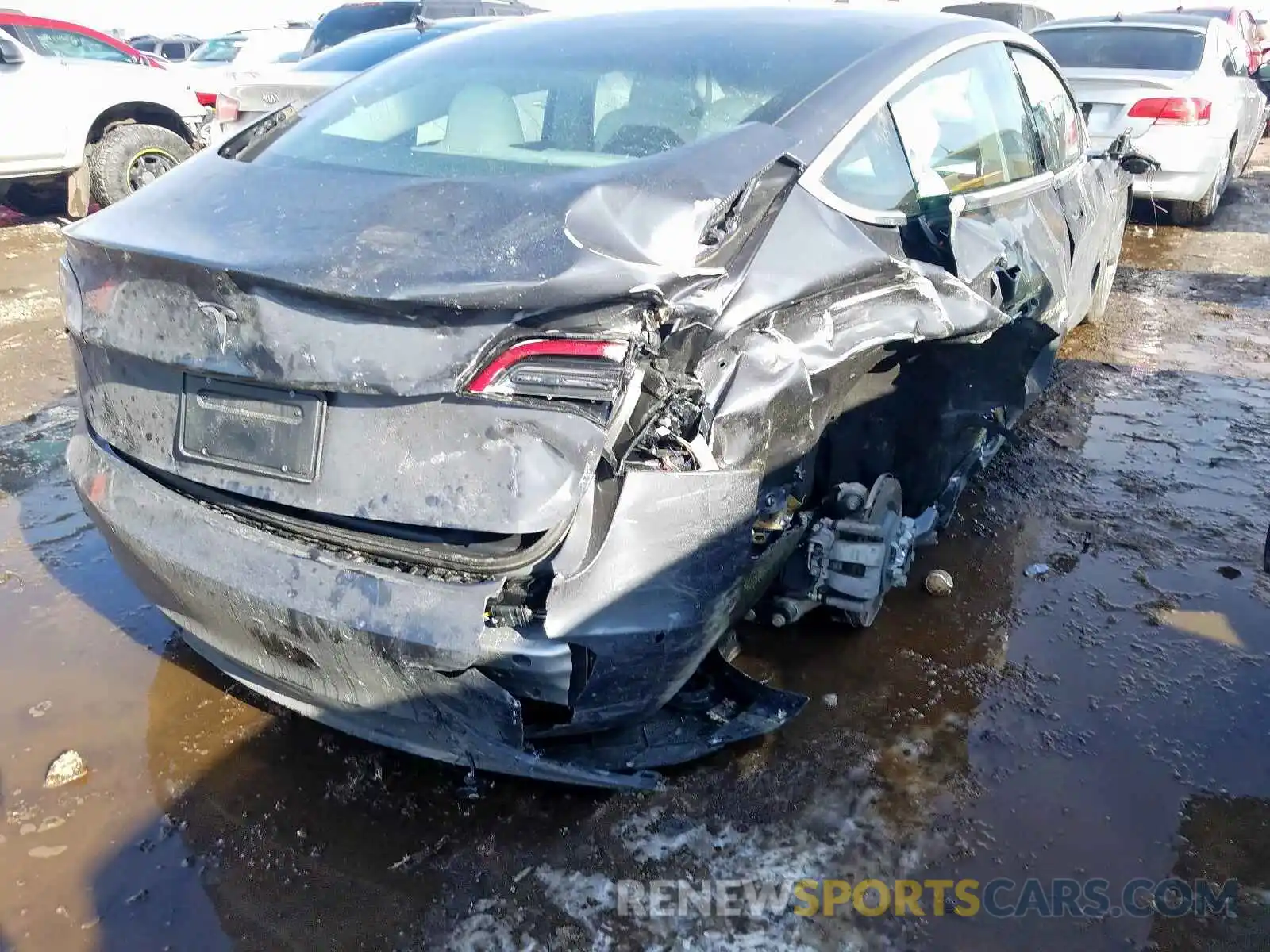 4 Photograph of a damaged car 5YJ3E1EA1LF599048 TESLA MODEL 3 2020