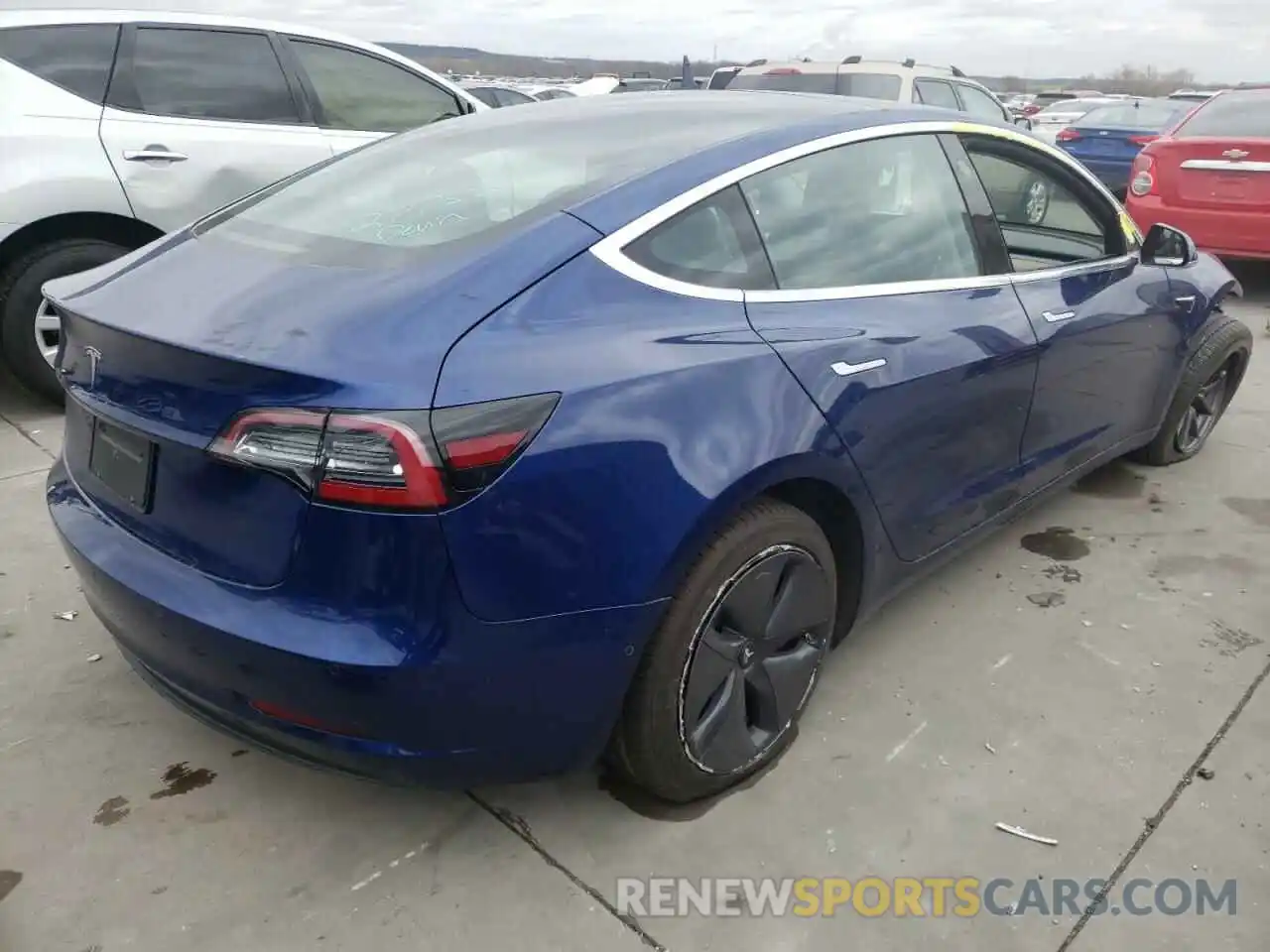 4 Photograph of a damaged car 5YJ3E1EA1LF611828 TESLA MODEL 3 2020