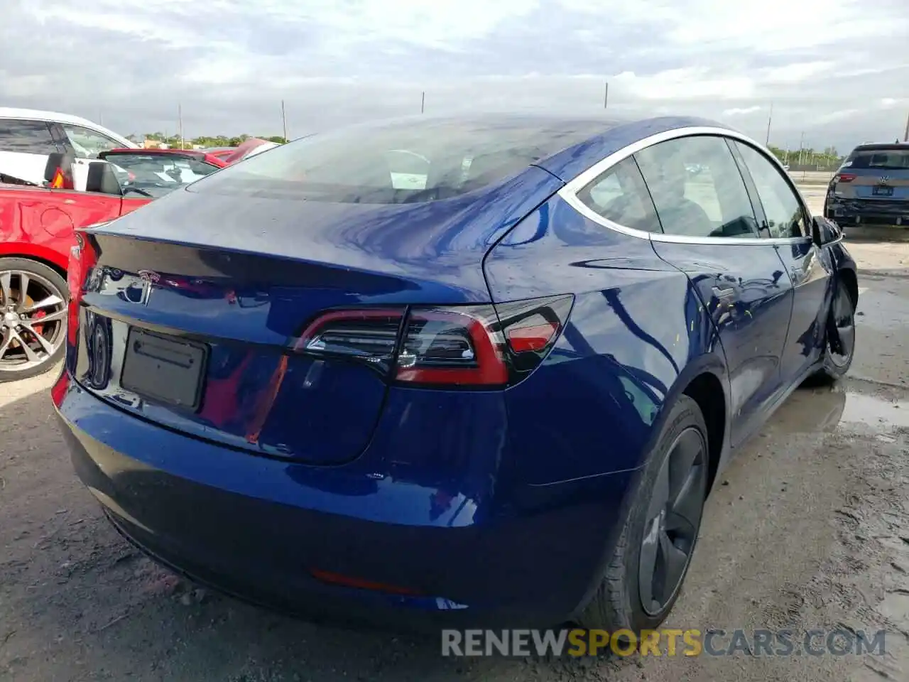 4 Photograph of a damaged car 5YJ3E1EA1LF611957 TESLA MODEL 3 2020