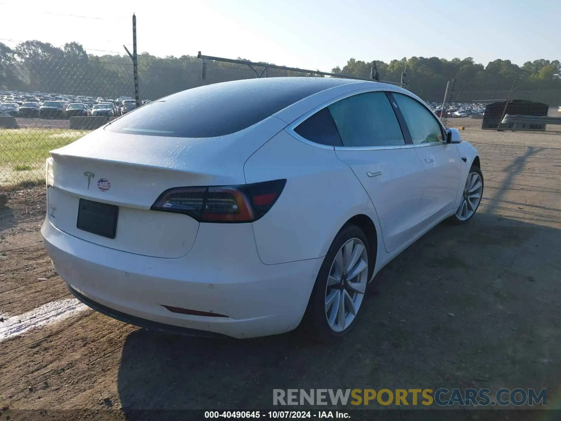 4 Photograph of a damaged car 5YJ3E1EA1LF614440 TESLA MODEL 3 2020