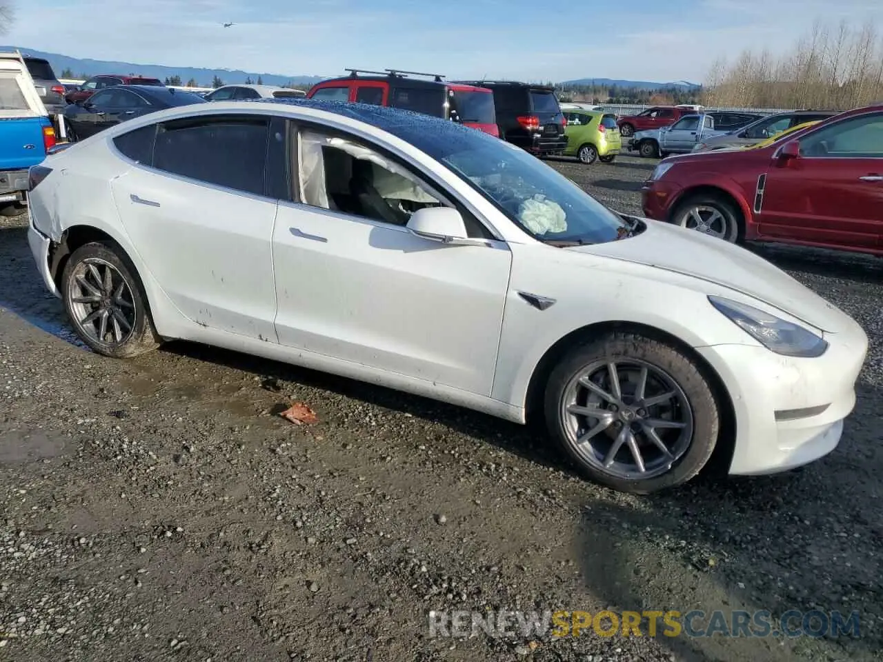 4 Photograph of a damaged car 5YJ3E1EA1LF632873 TESLA MODEL 3 2020