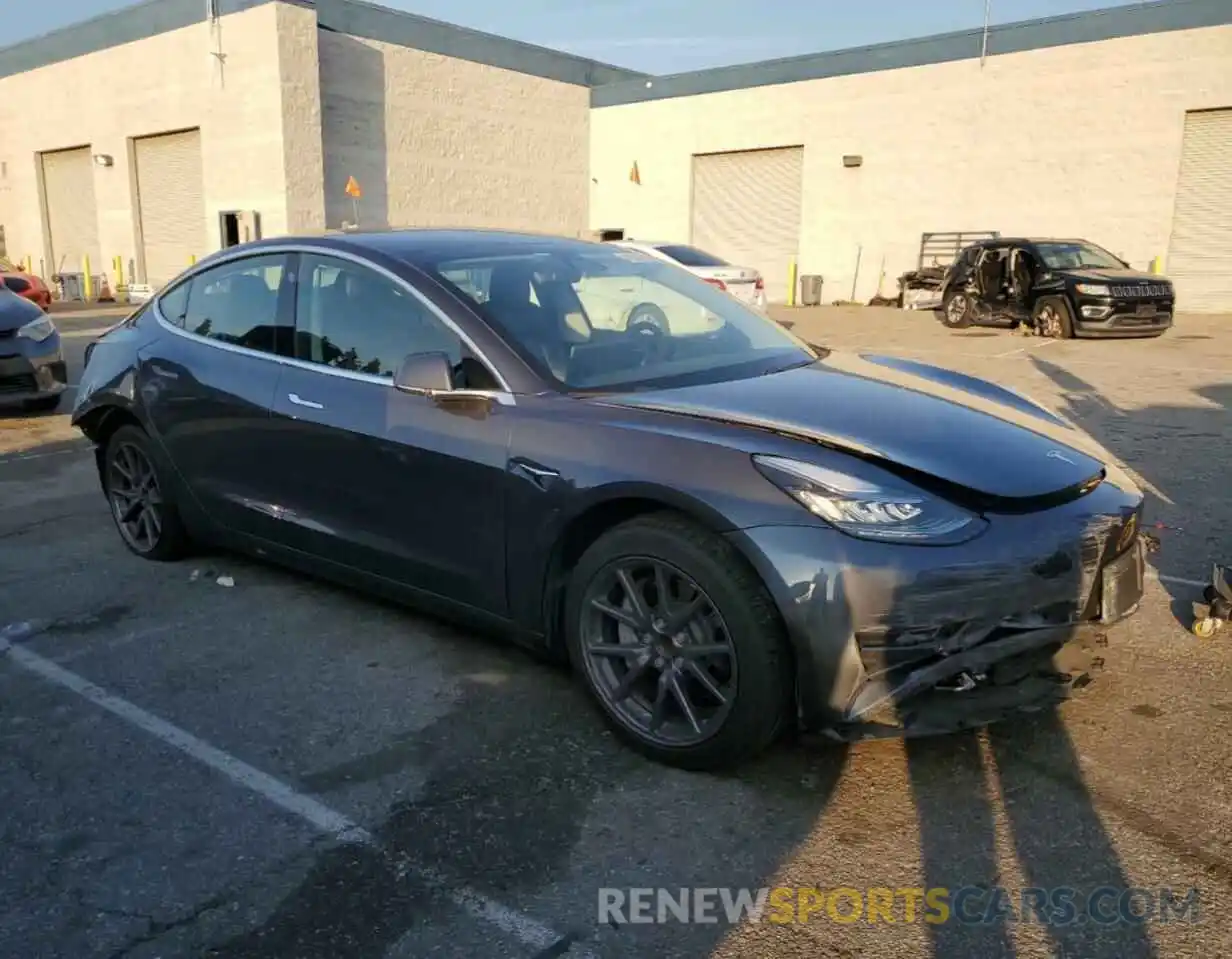 4 Photograph of a damaged car 5YJ3E1EA1LF643937 TESLA MODEL 3 2020