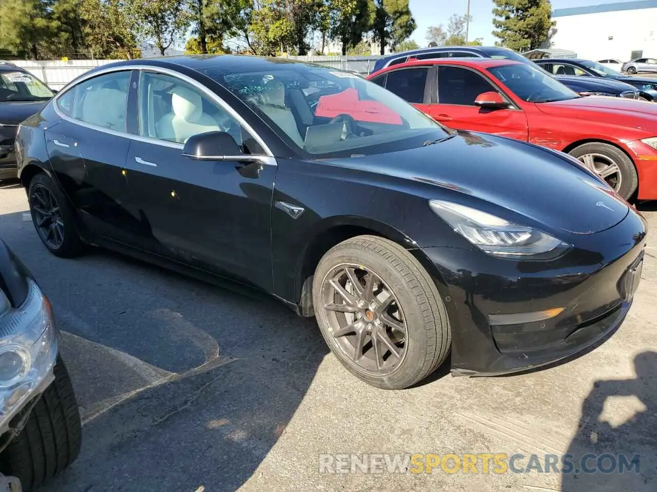 4 Photograph of a damaged car 5YJ3E1EA1LF645879 TESLA MODEL 3 2020
