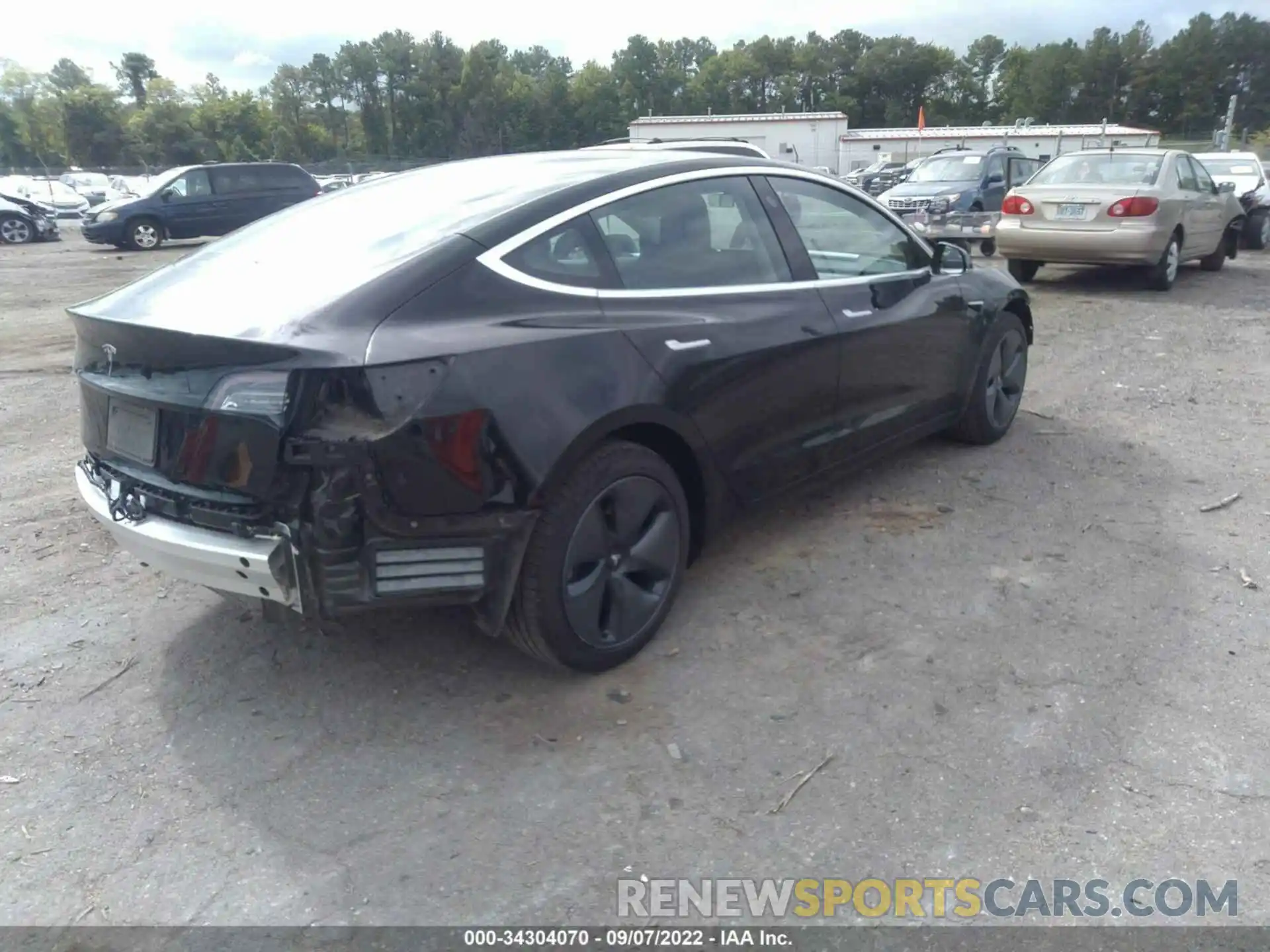 4 Photograph of a damaged car 5YJ3E1EA1LF657613 TESLA MODEL 3 2020