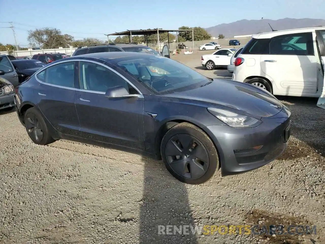 4 Photograph of a damaged car 5YJ3E1EA1LF658194 TESLA MODEL 3 2020