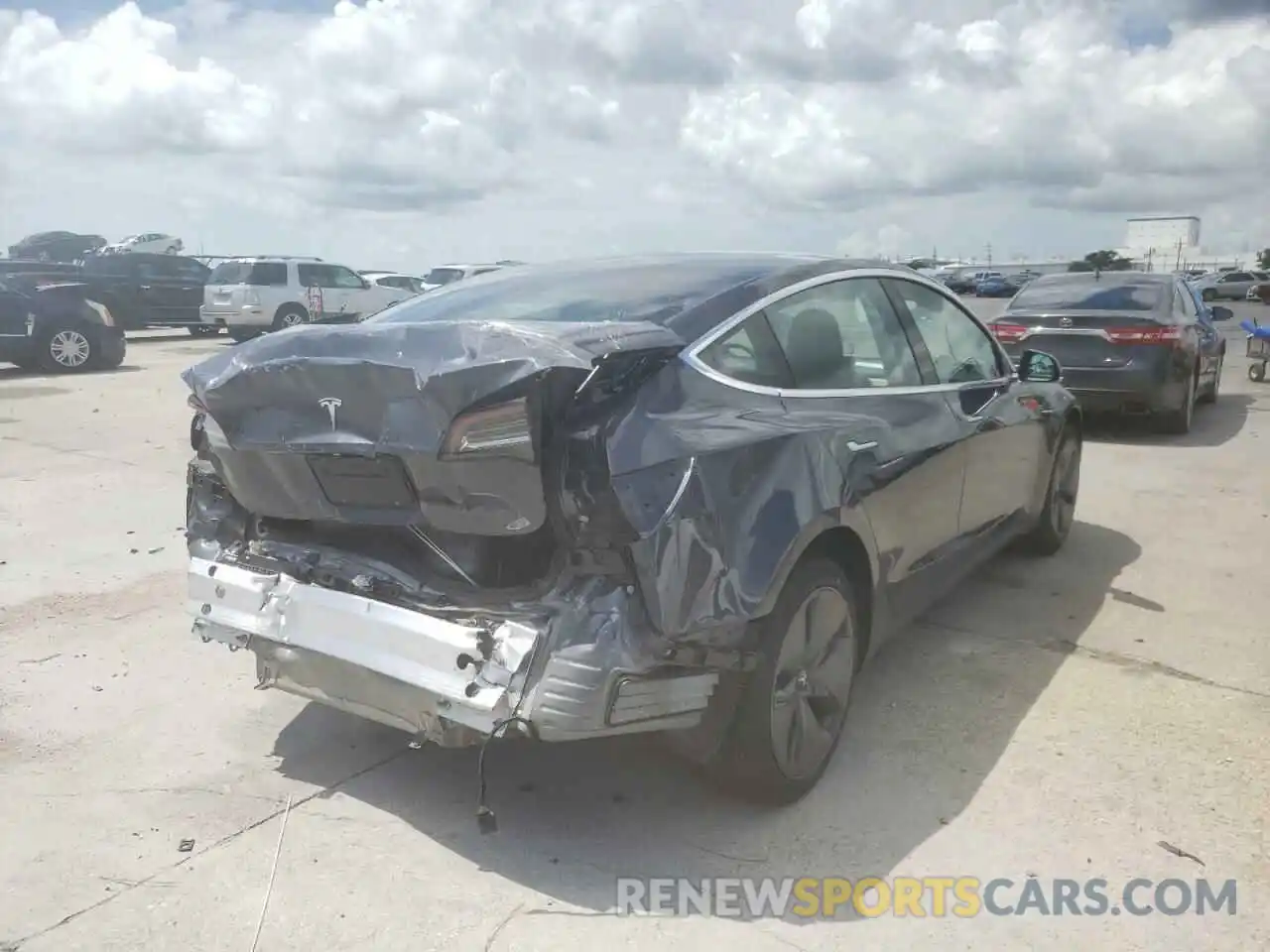 4 Photograph of a damaged car 5YJ3E1EA1LF658230 TESLA MODEL 3 2020