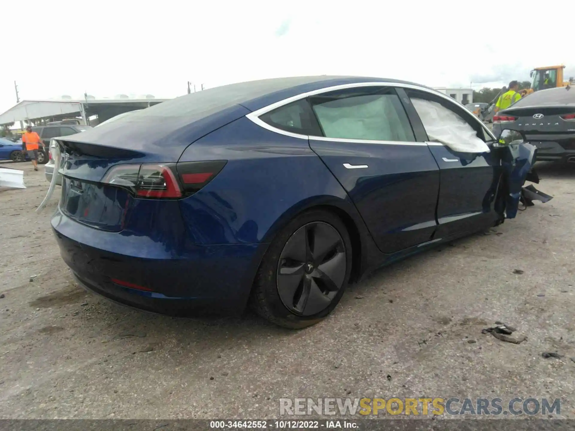 4 Photograph of a damaged car 5YJ3E1EA1LF658339 TESLA MODEL 3 2020