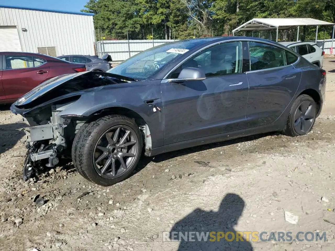 1 Photograph of a damaged car 5YJ3E1EA1LF659748 TESLA MODEL 3 2020