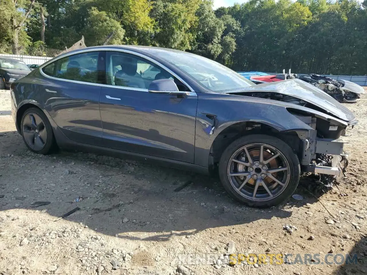 4 Photograph of a damaged car 5YJ3E1EA1LF659748 TESLA MODEL 3 2020