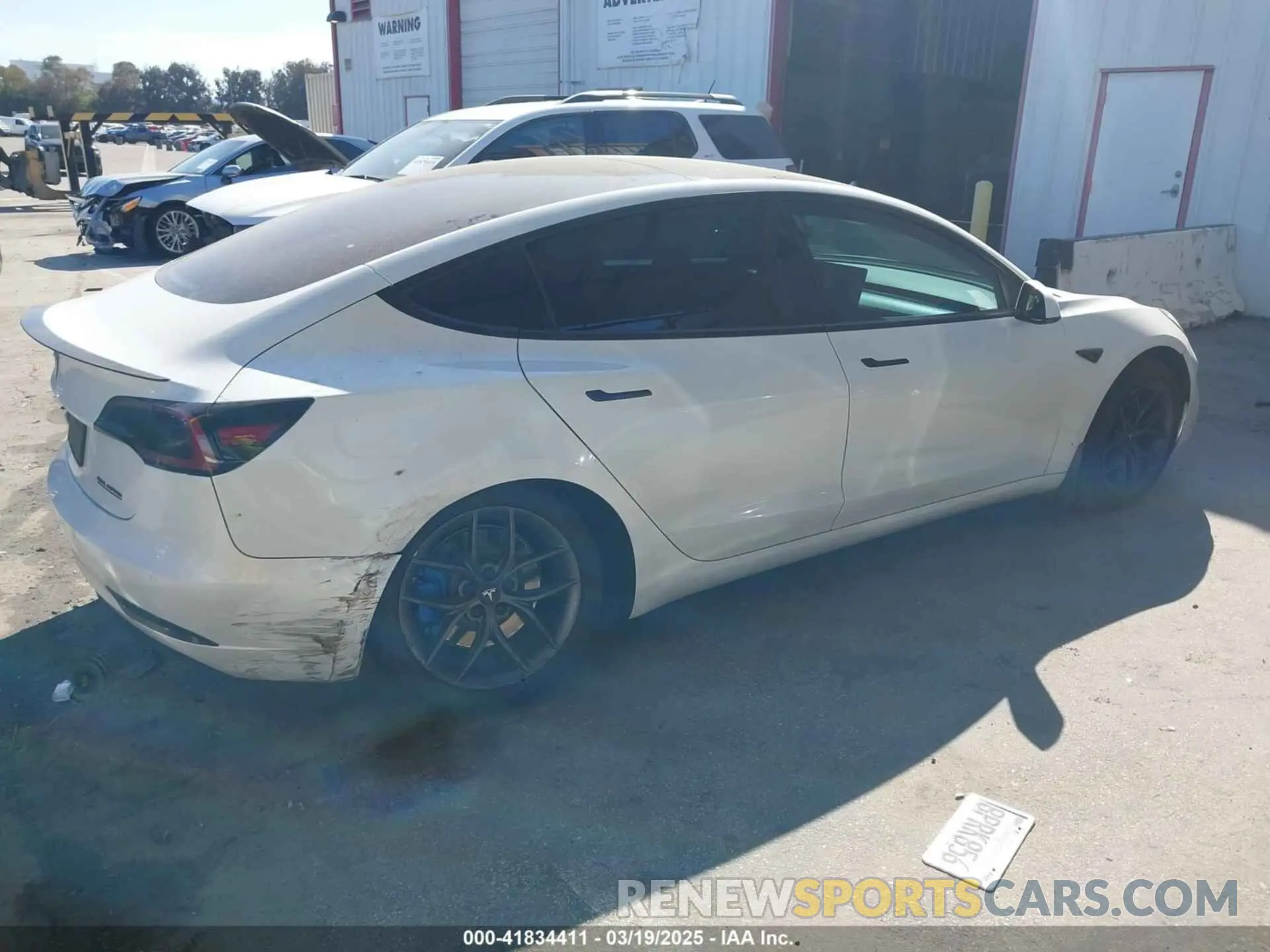 4 Photograph of a damaged car 5YJ3E1EA1LF659765 TESLA MODEL 3 2020