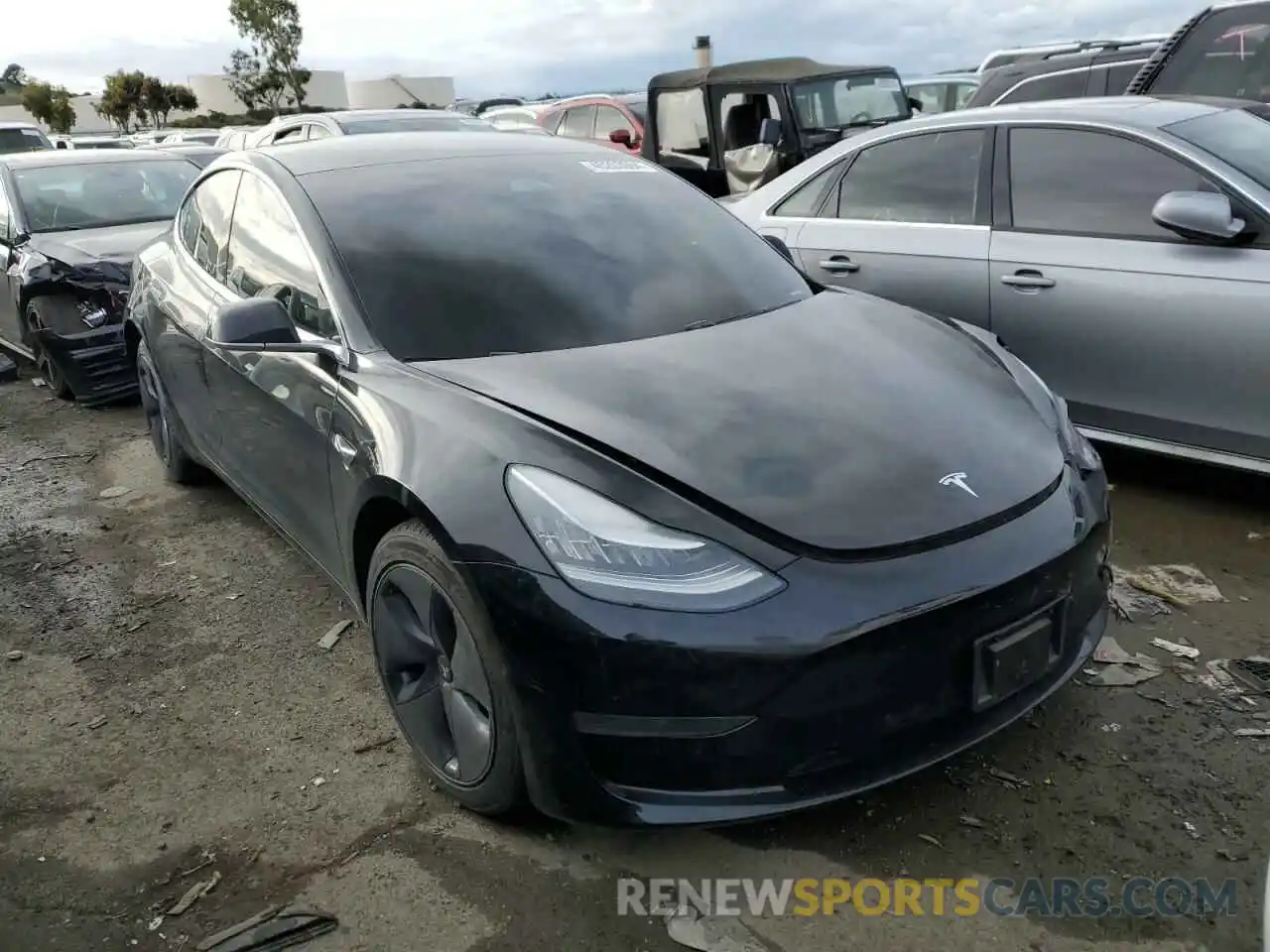 4 Photograph of a damaged car 5YJ3E1EA1LF704574 TESLA MODEL 3 2020