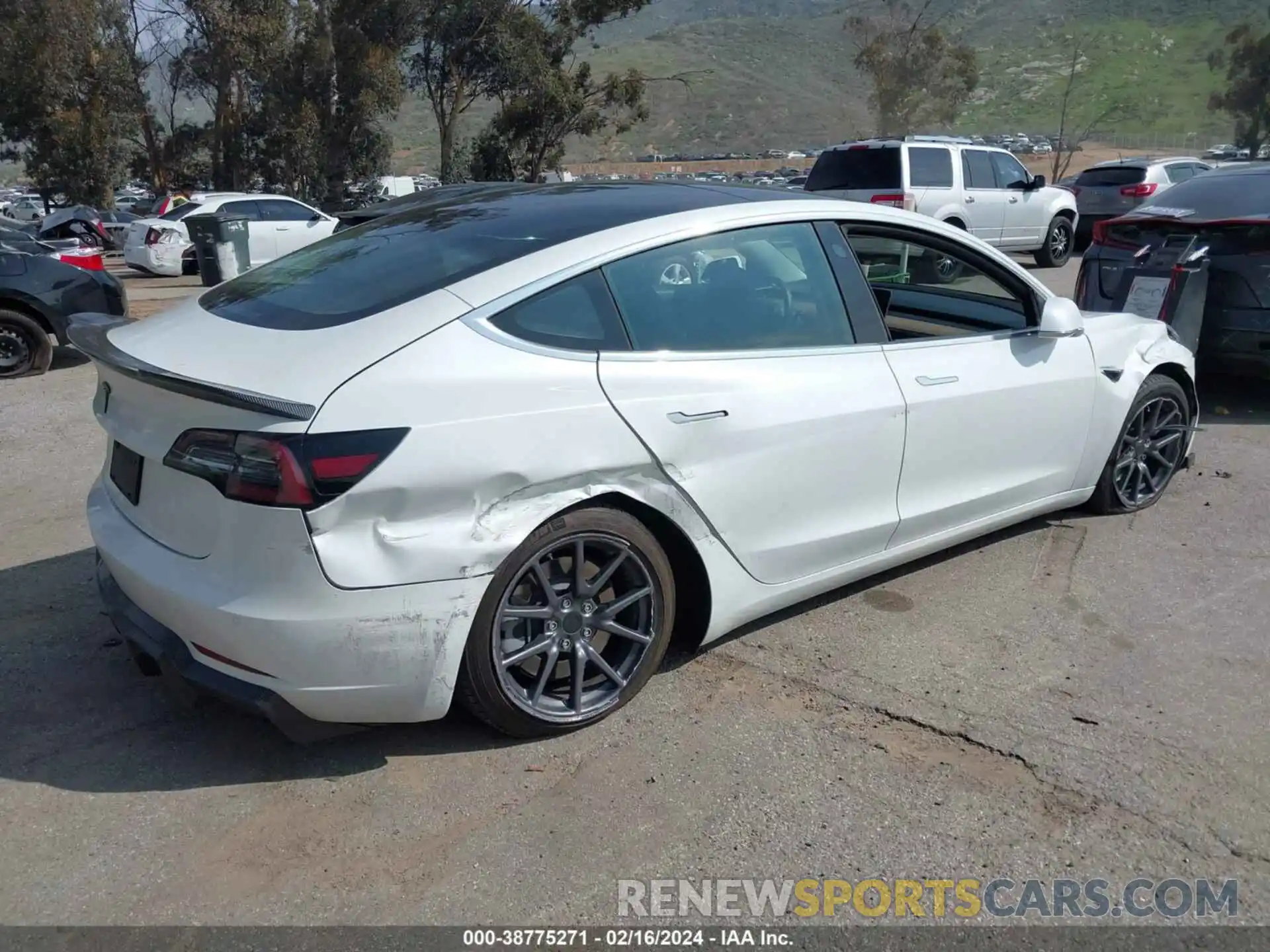 4 Photograph of a damaged car 5YJ3E1EA1LF739891 TESLA MODEL 3 2020