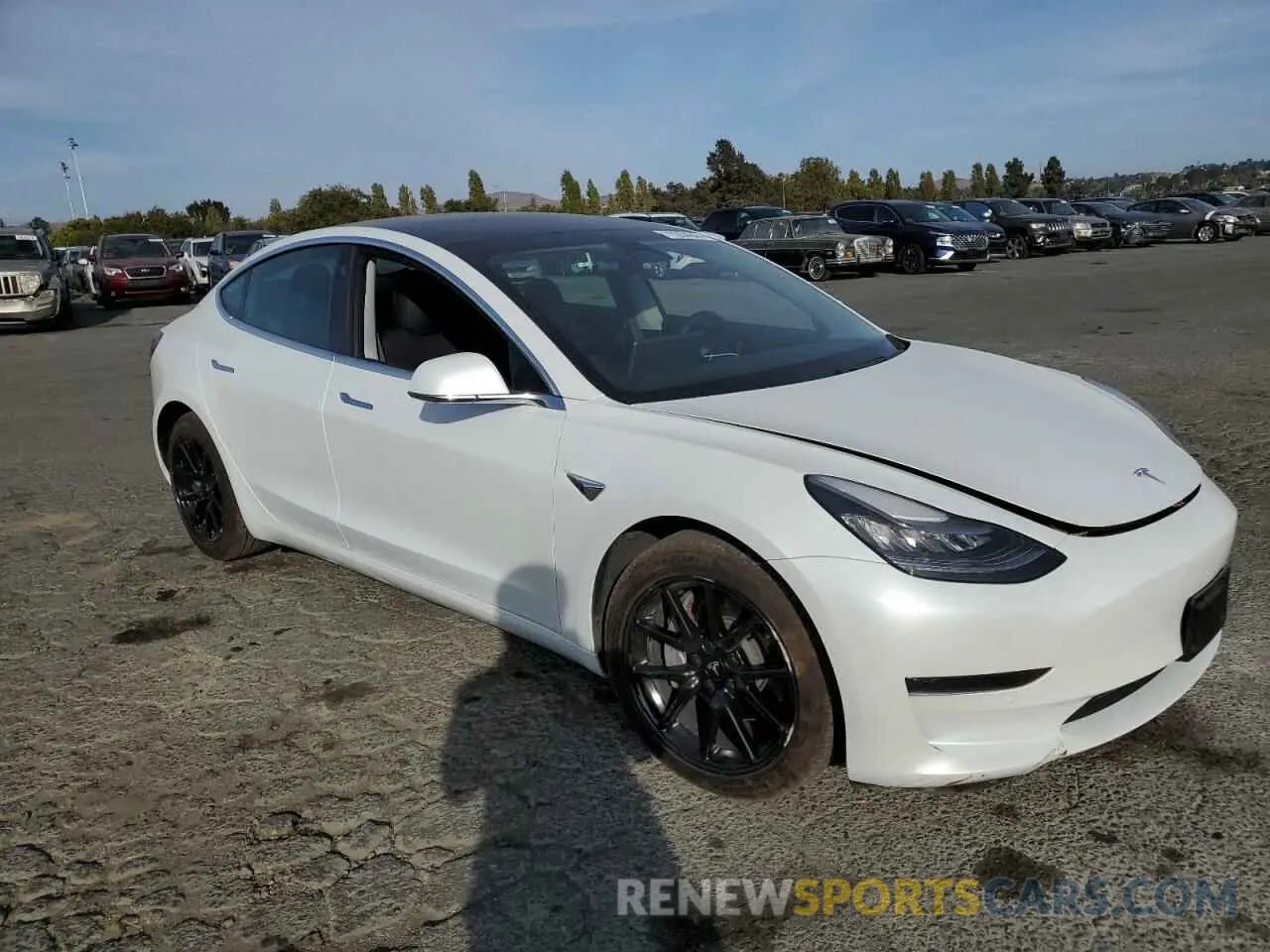 4 Photograph of a damaged car 5YJ3E1EA1LF739969 TESLA MODEL 3 2020