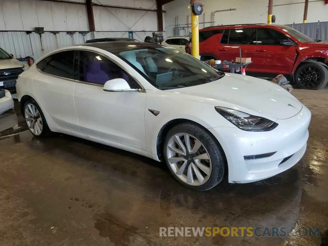 4 Photograph of a damaged car 5YJ3E1EA1LF741298 TESLA MODEL 3 2020