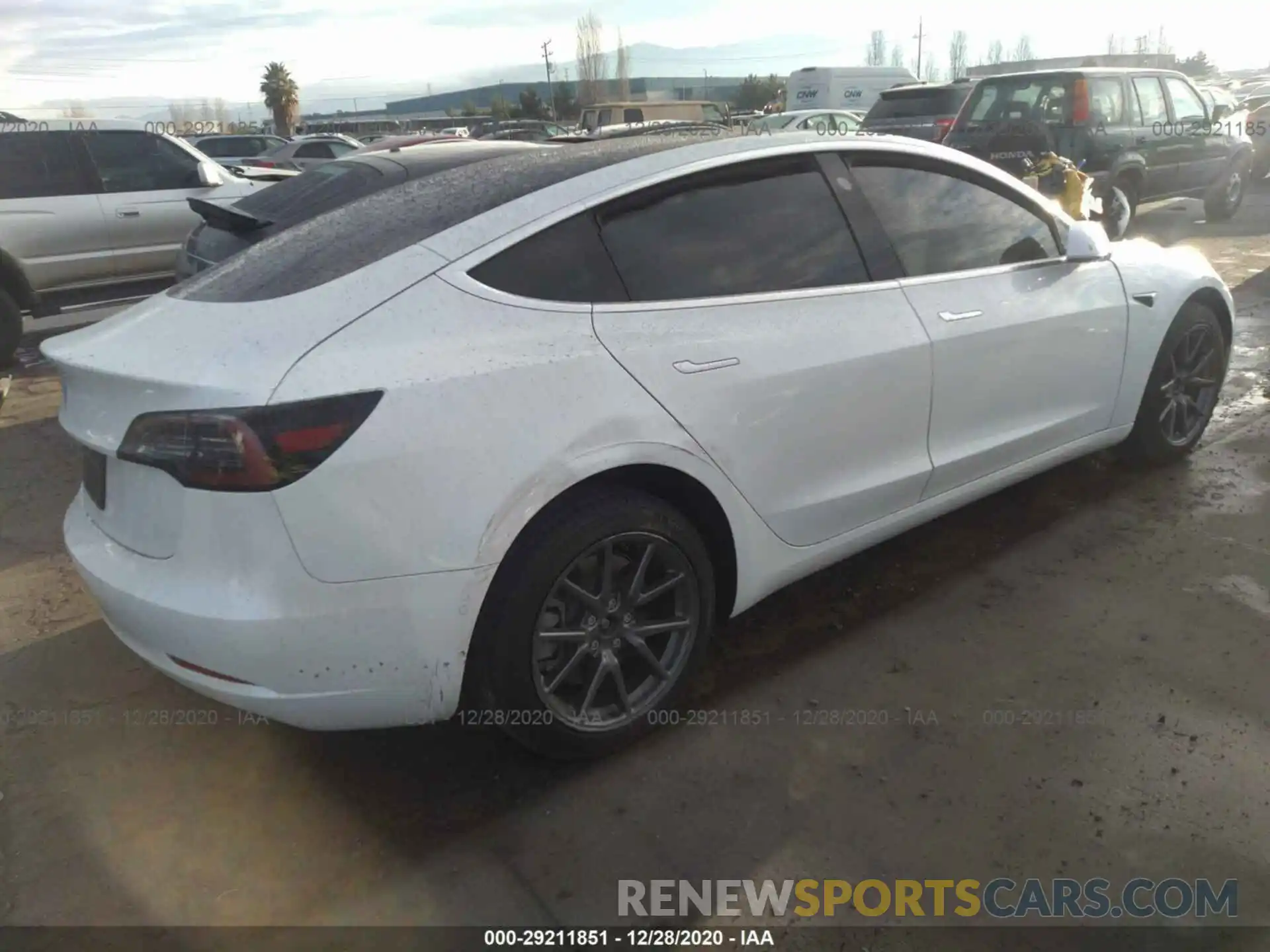 4 Photograph of a damaged car 5YJ3E1EA1LF745318 TESLA MODEL 3 2020