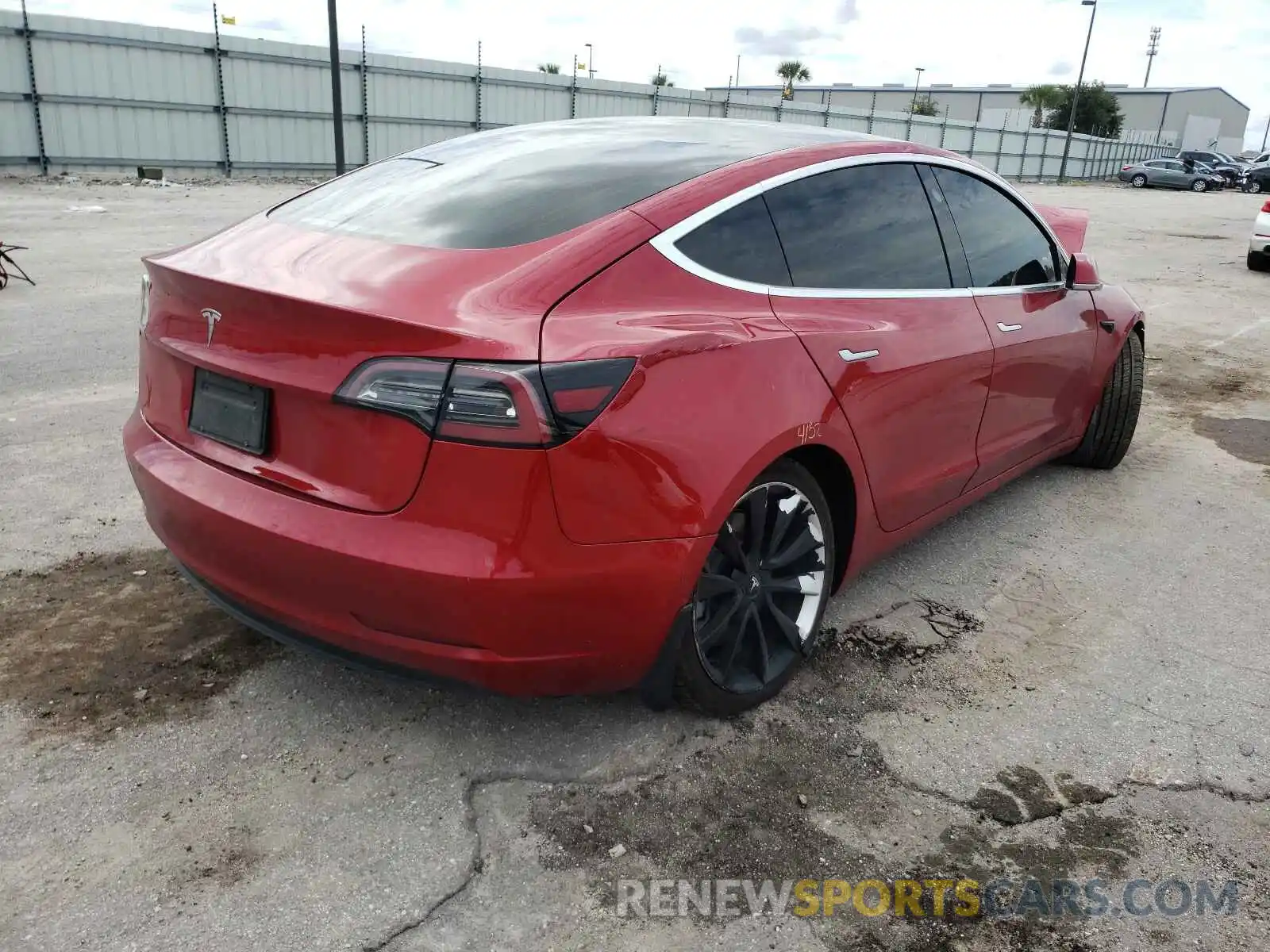 4 Photograph of a damaged car 5YJ3E1EA1LF792977 TESLA MODEL 3 2020