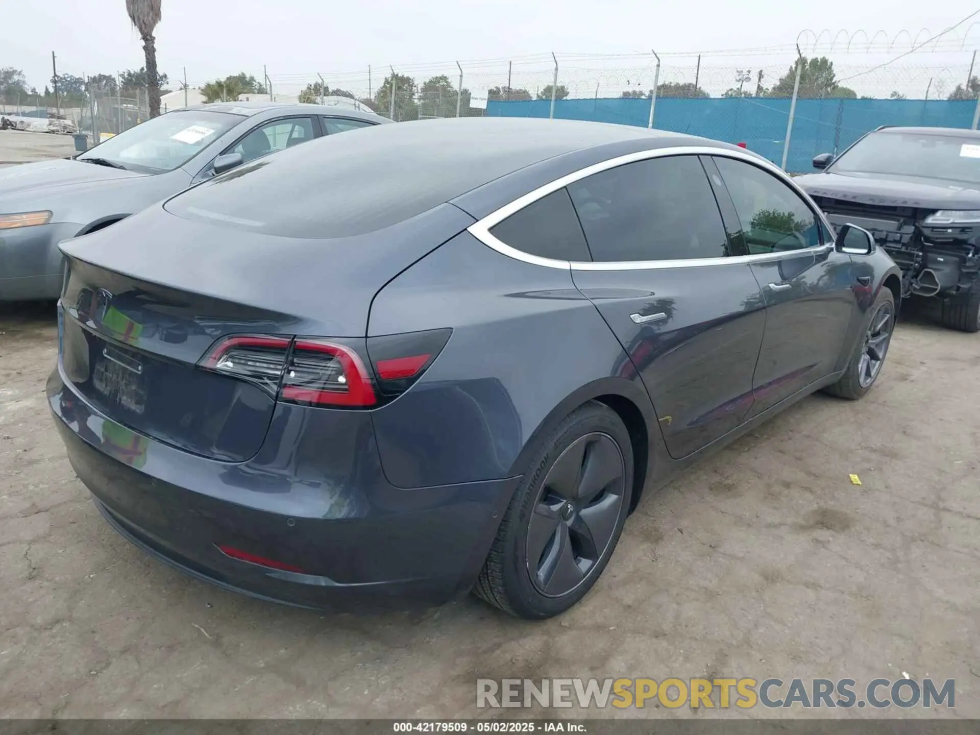 4 Photograph of a damaged car 5YJ3E1EA1LF799136 TESLA MODEL 3 2020