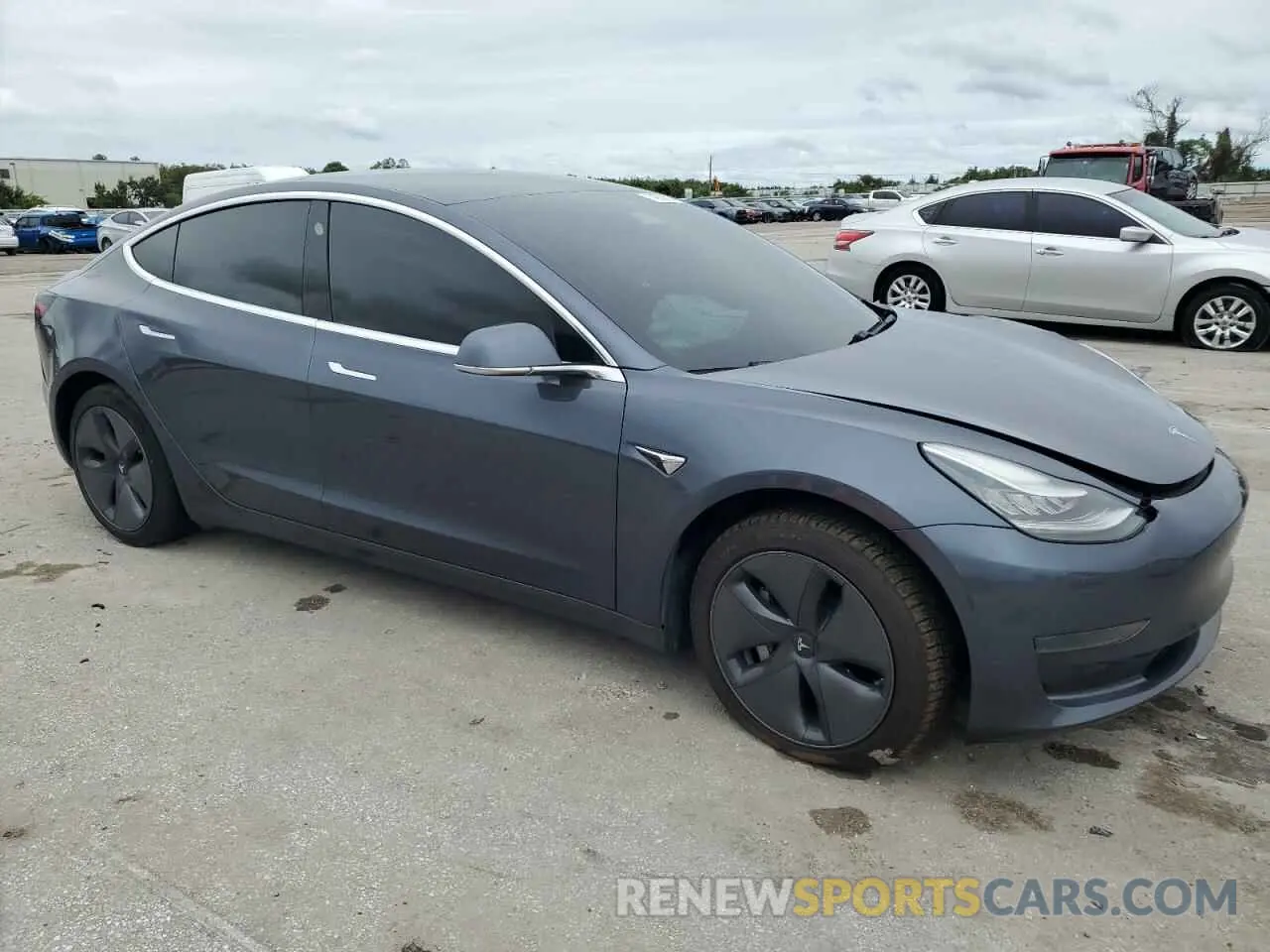 4 Photograph of a damaged car 5YJ3E1EA2LF598328 TESLA MODEL 3 2020