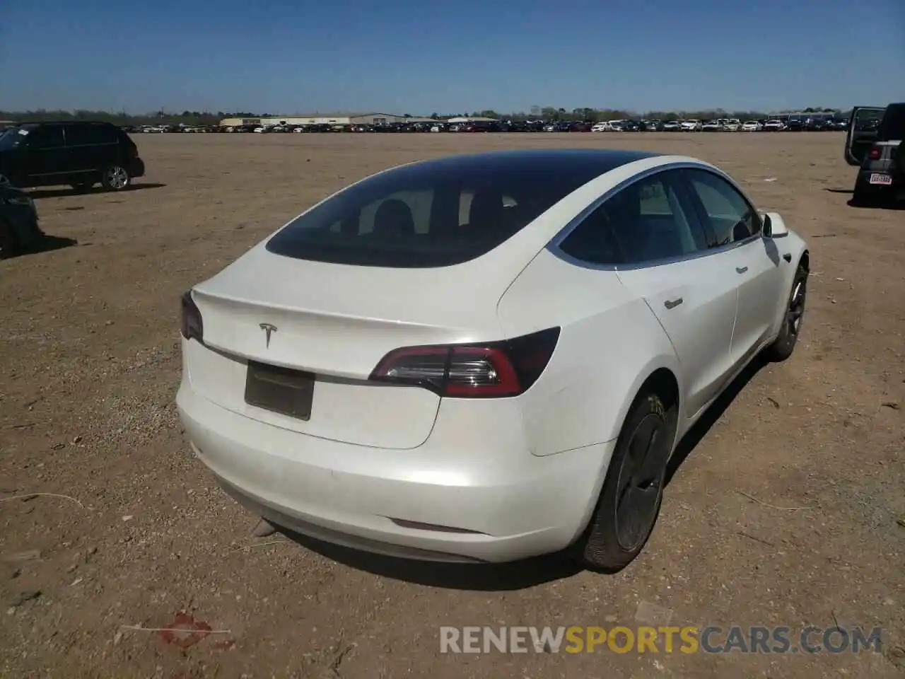 4 Photograph of a damaged car 5YJ3E1EA2LF612809 TESLA MODEL 3 2020