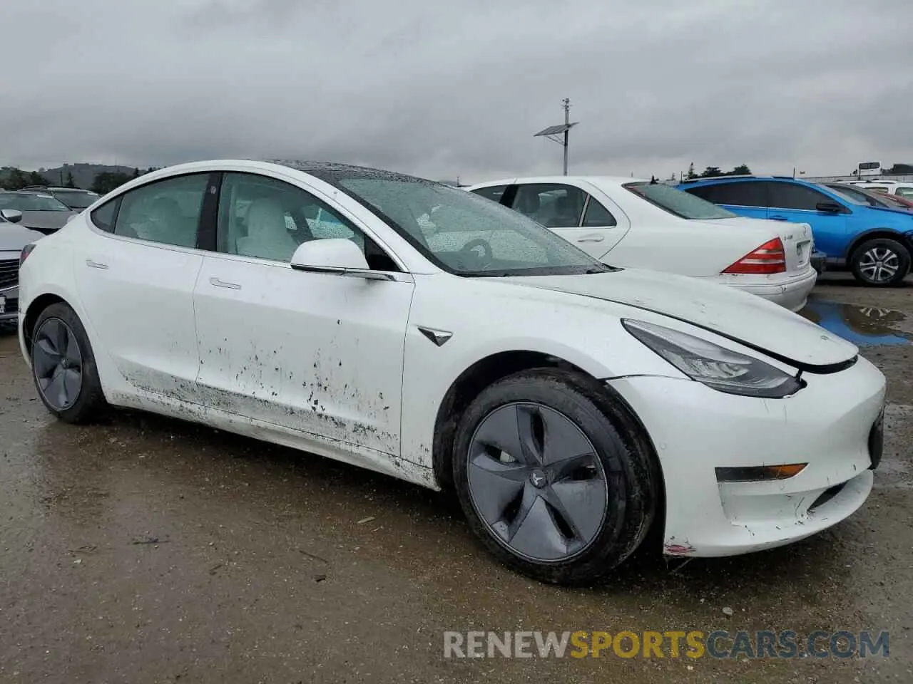 4 Photograph of a damaged car 5YJ3E1EA2LF615578 TESLA MODEL 3 2020