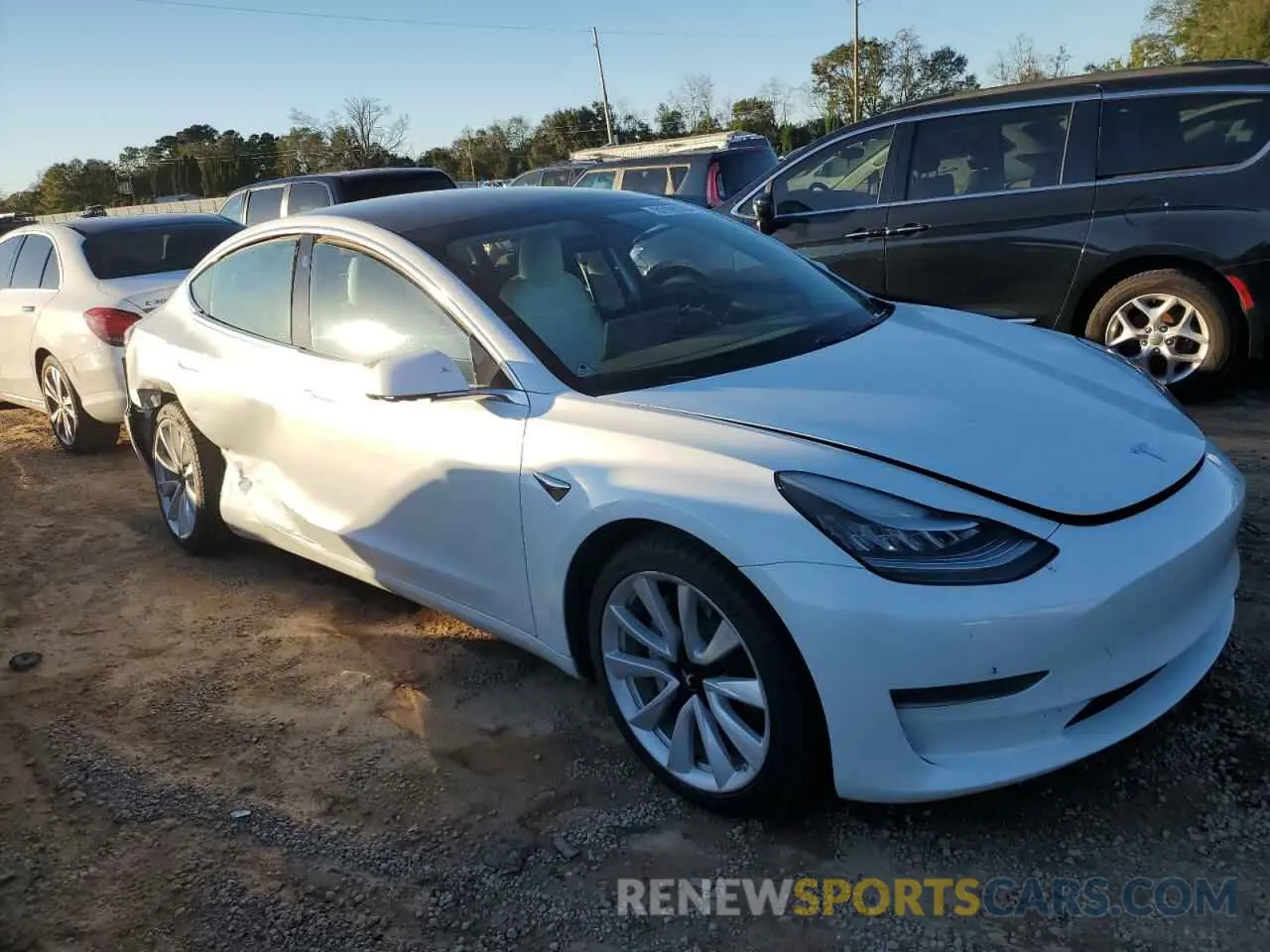 4 Photograph of a damaged car 5YJ3E1EA2LF634986 TESLA MODEL 3 2020