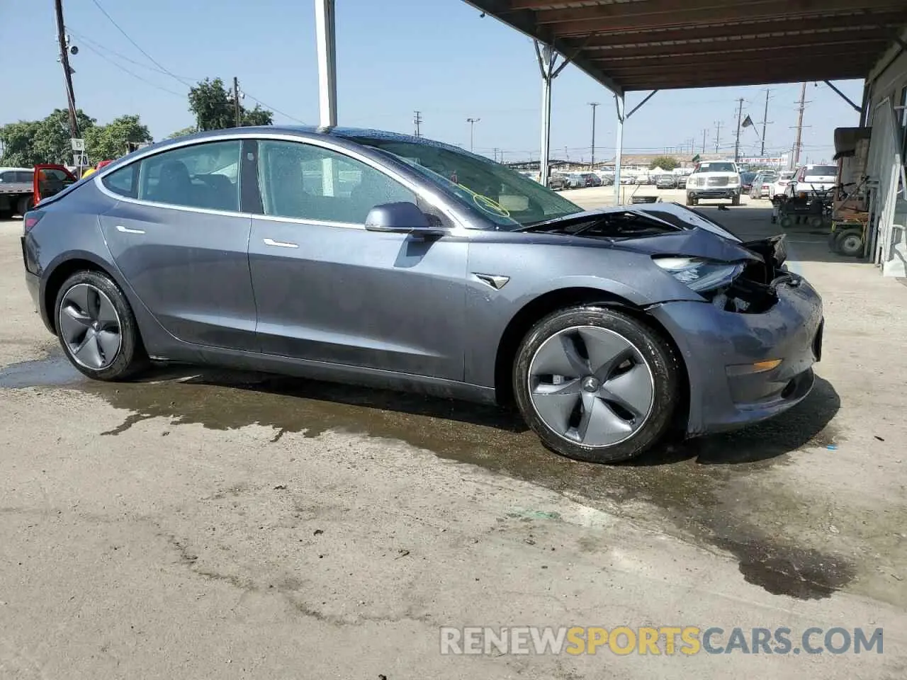 4 Photograph of a damaged car 5YJ3E1EA2LF644238 TESLA MODEL 3 2020