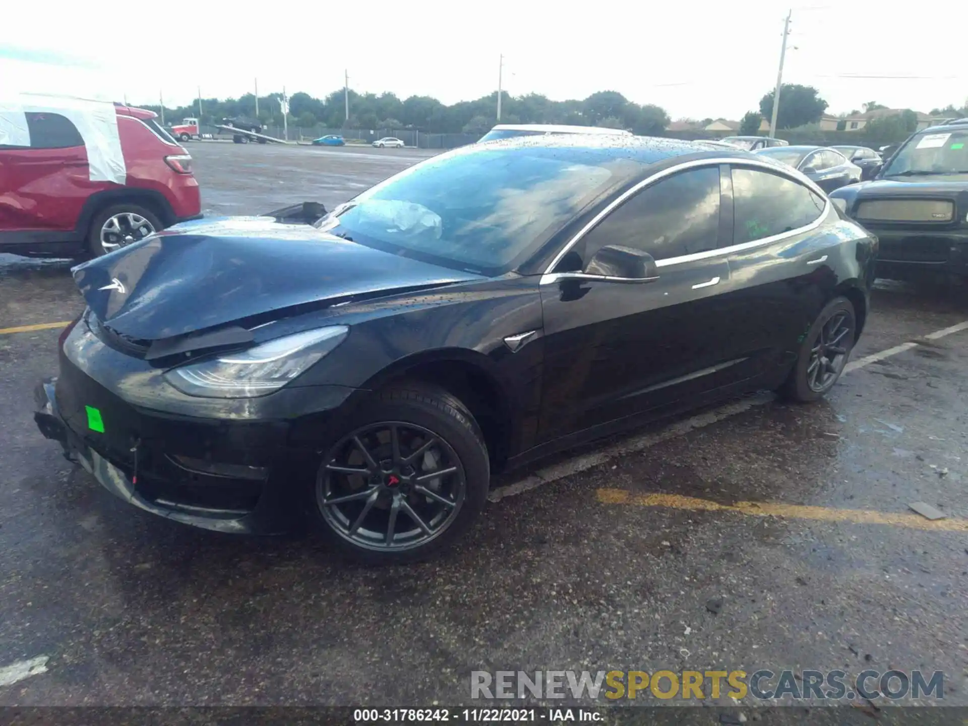 2 Photograph of a damaged car 5YJ3E1EA2LF657409 TESLA MODEL 3 2020