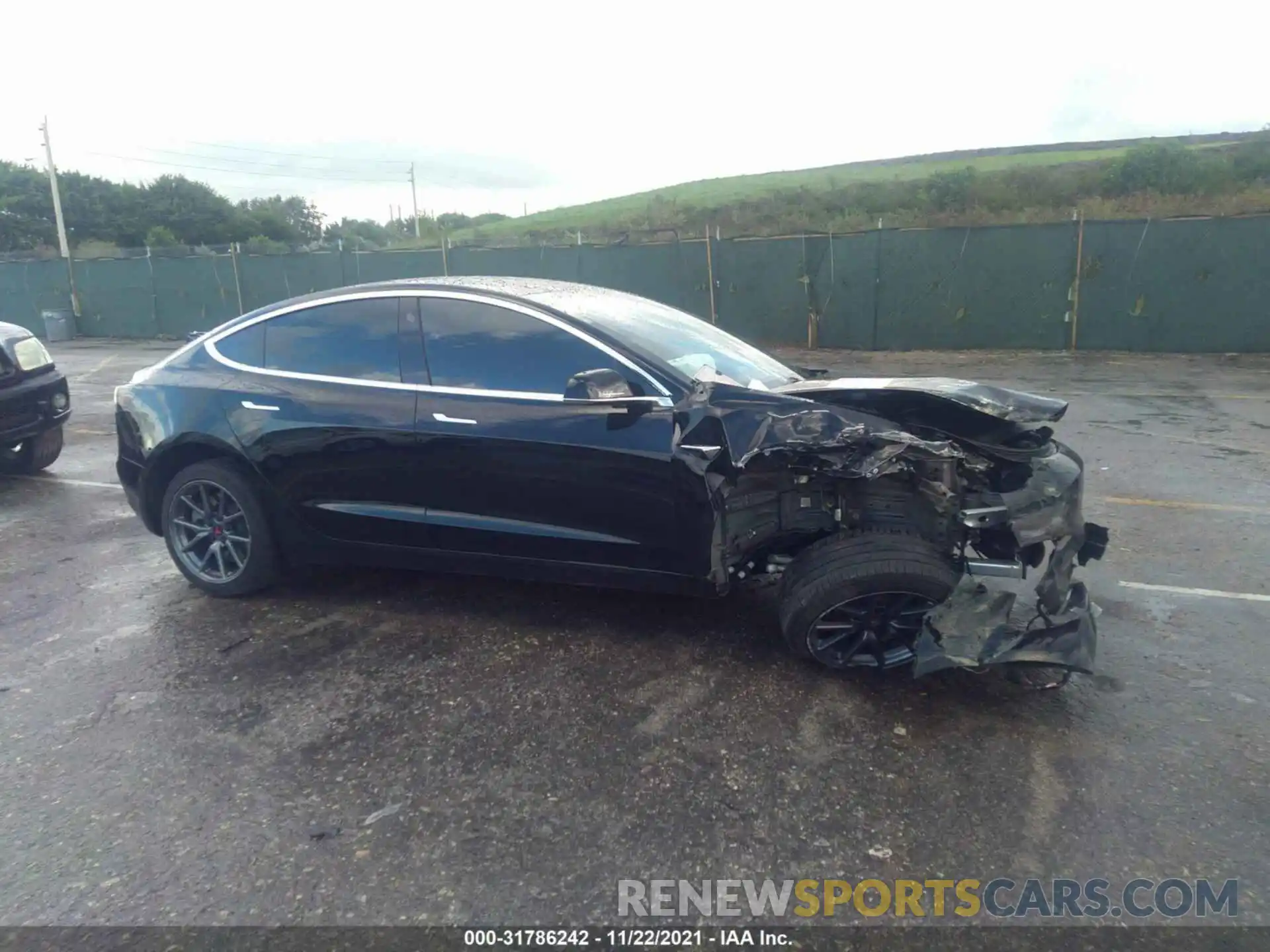 6 Photograph of a damaged car 5YJ3E1EA2LF657409 TESLA MODEL 3 2020