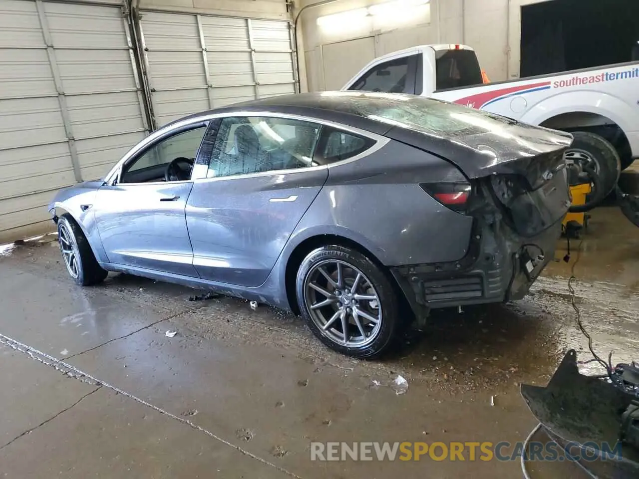 2 Photograph of a damaged car 5YJ3E1EA2LF658124 TESLA MODEL 3 2020
