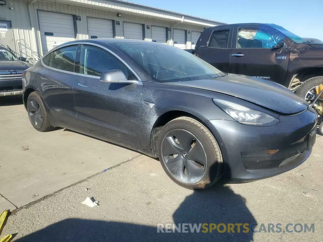 4 Photograph of a damaged car 5YJ3E1EA2LF658205 TESLA MODEL 3 2020