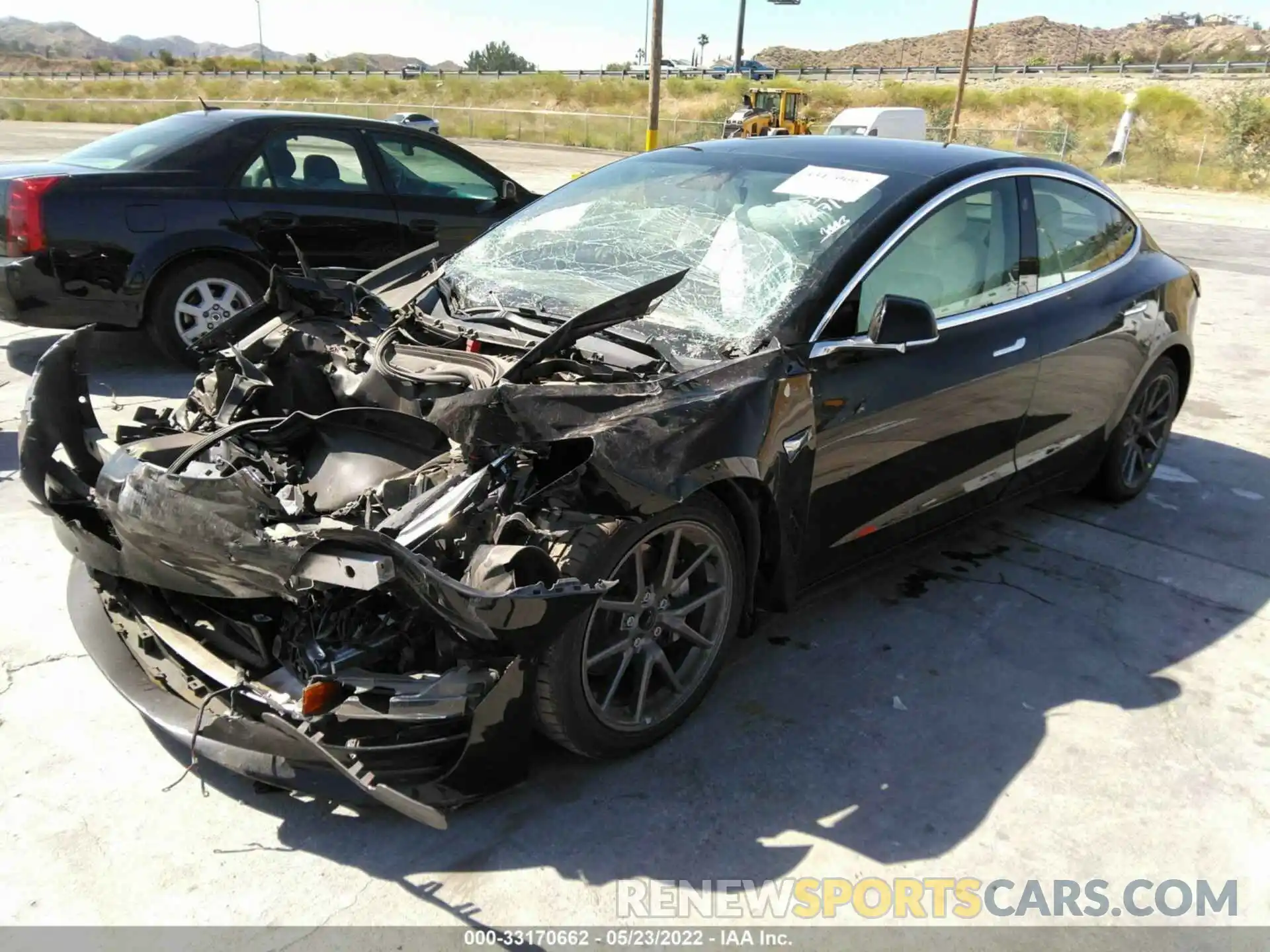 2 Photograph of a damaged car 5YJ3E1EA2LF662075 TESLA MODEL 3 2020