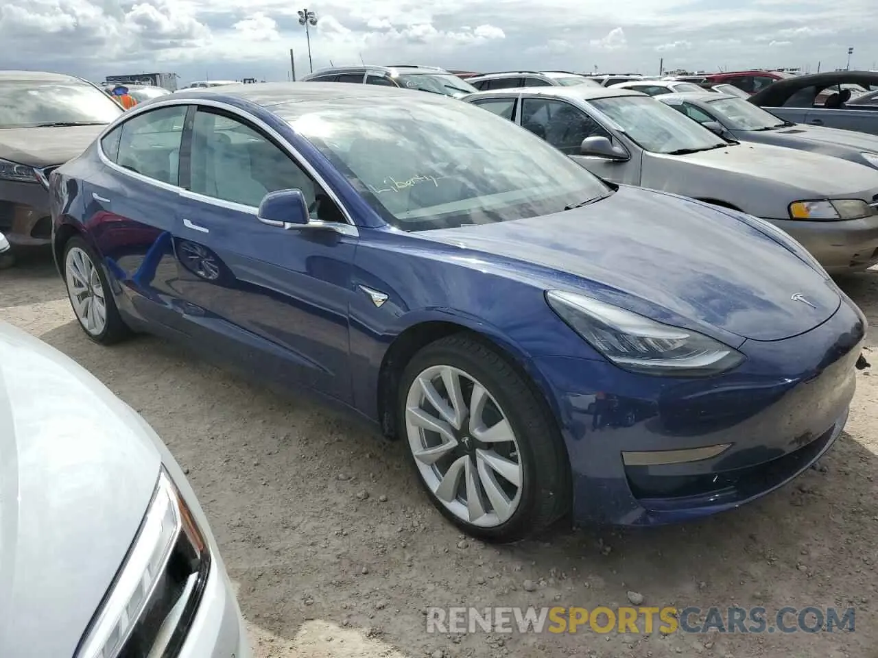 4 Photograph of a damaged car 5YJ3E1EA2LF662688 TESLA MODEL 3 2020