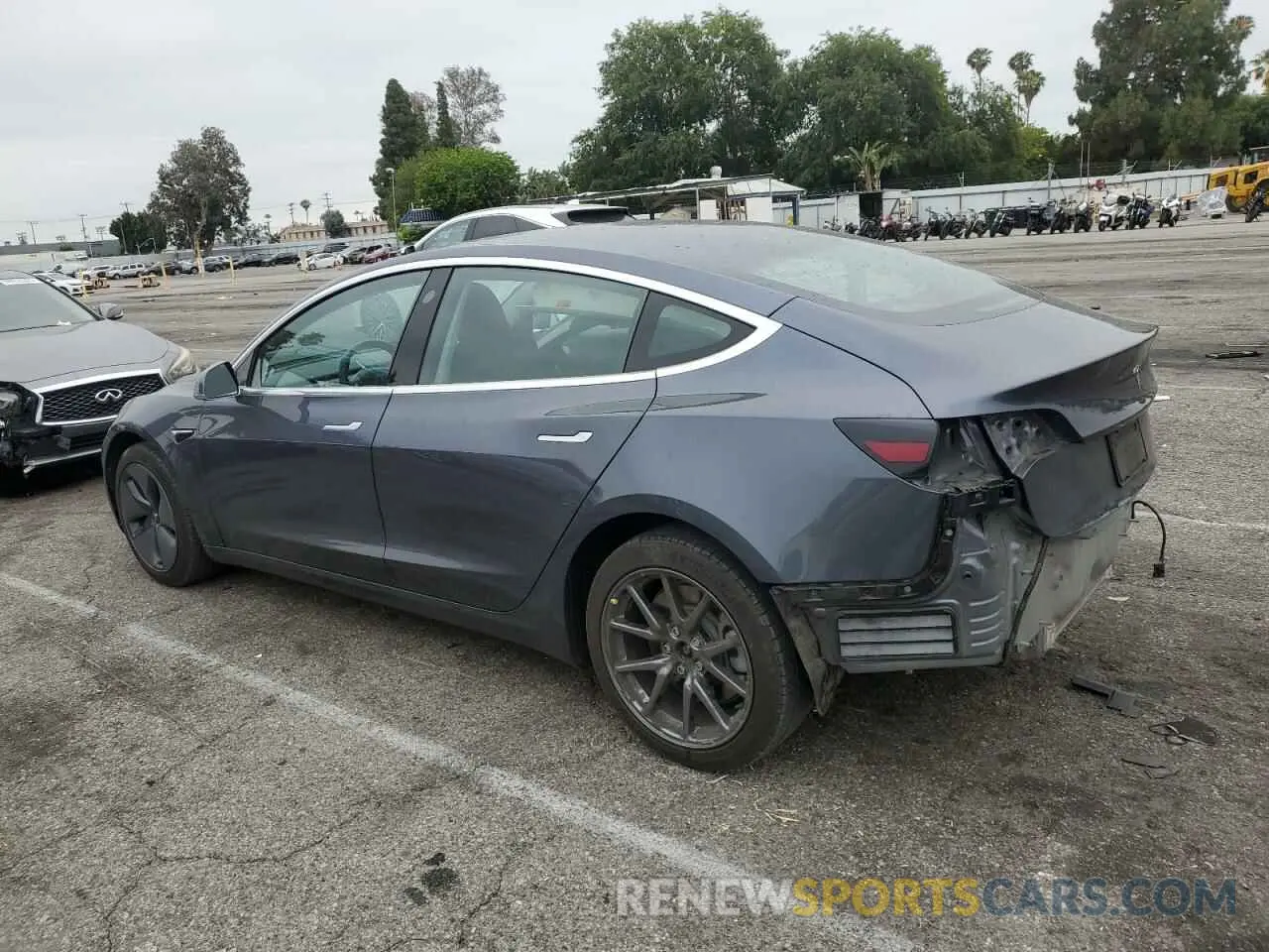 2 Photograph of a damaged car 5YJ3E1EA2LF704941 TESLA MODEL 3 2020