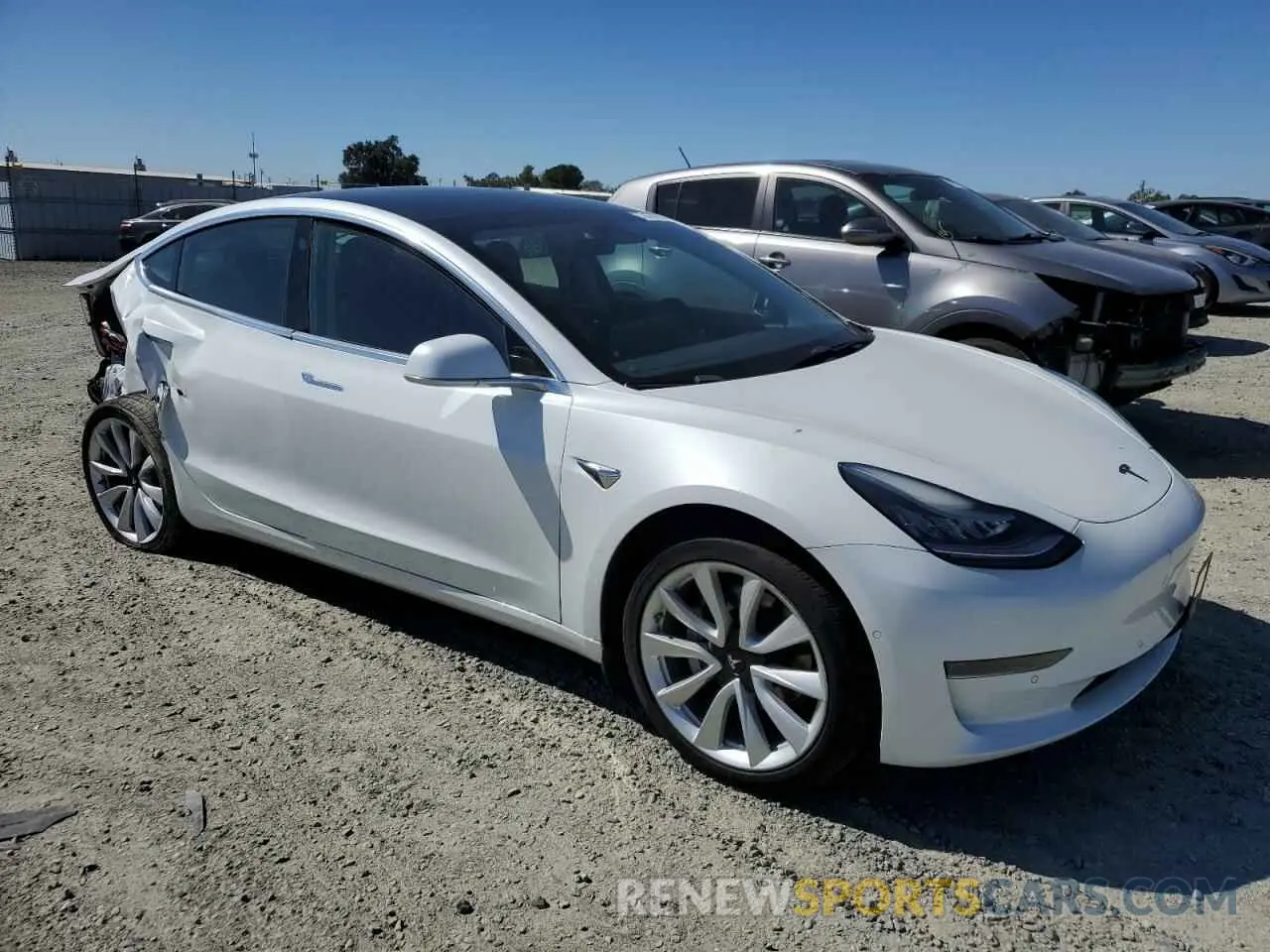 4 Photograph of a damaged car 5YJ3E1EA2LF709184 TESLA MODEL 3 2020