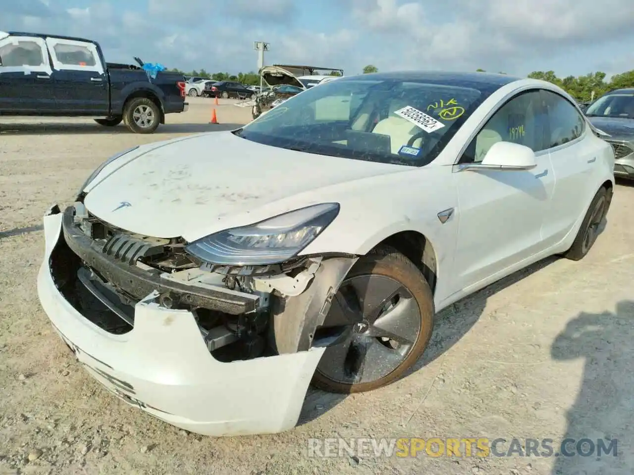 2 Photograph of a damaged car 5YJ3E1EA2LF718127 TESLA MODEL 3 2020