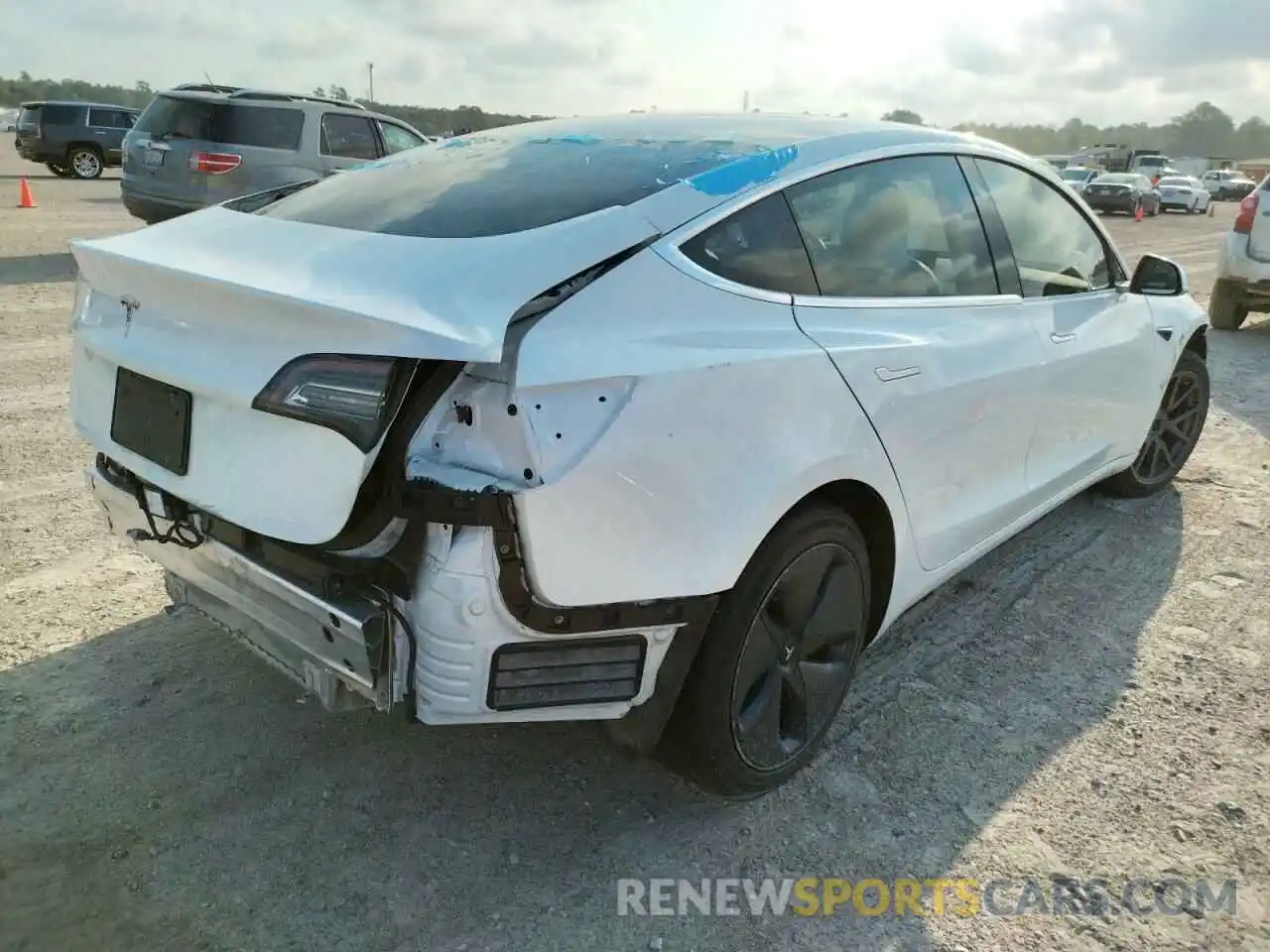 4 Photograph of a damaged car 5YJ3E1EA2LF718127 TESLA MODEL 3 2020