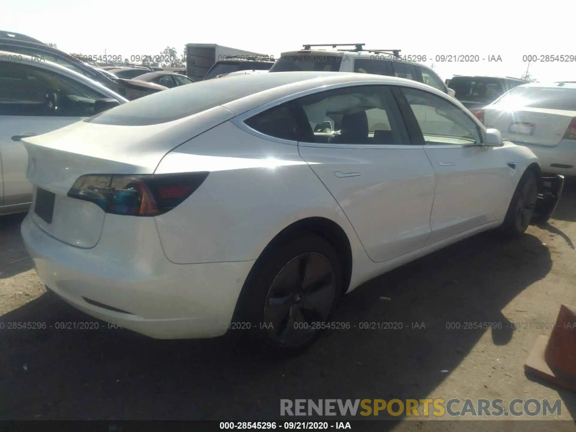 4 Photograph of a damaged car 5YJ3E1EA2LF737051 TESLA MODEL 3 2020