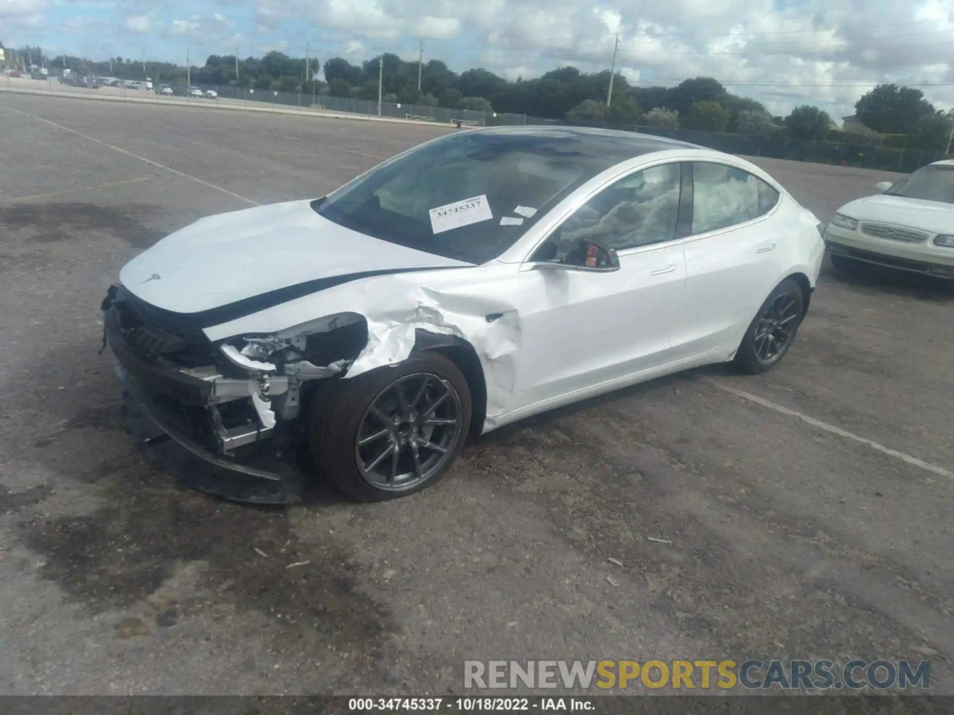 2 Photograph of a damaged car 5YJ3E1EA2LF792583 TESLA MODEL 3 2020