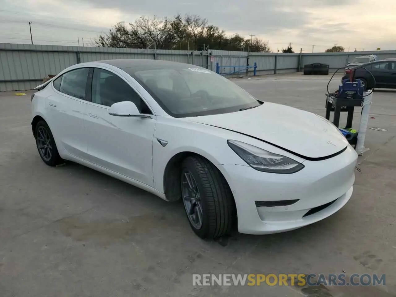 4 Photograph of a damaged car 5YJ3E1EA2LF799632 TESLA MODEL 3 2020