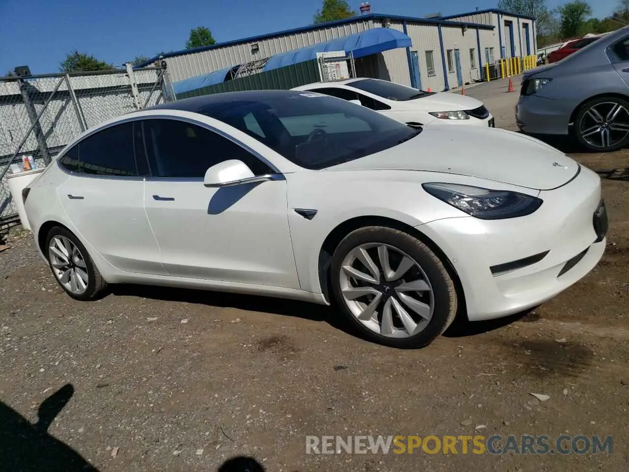 4 Photograph of a damaged car 5YJ3E1EA3LF598824 TESLA MODEL 3 2020