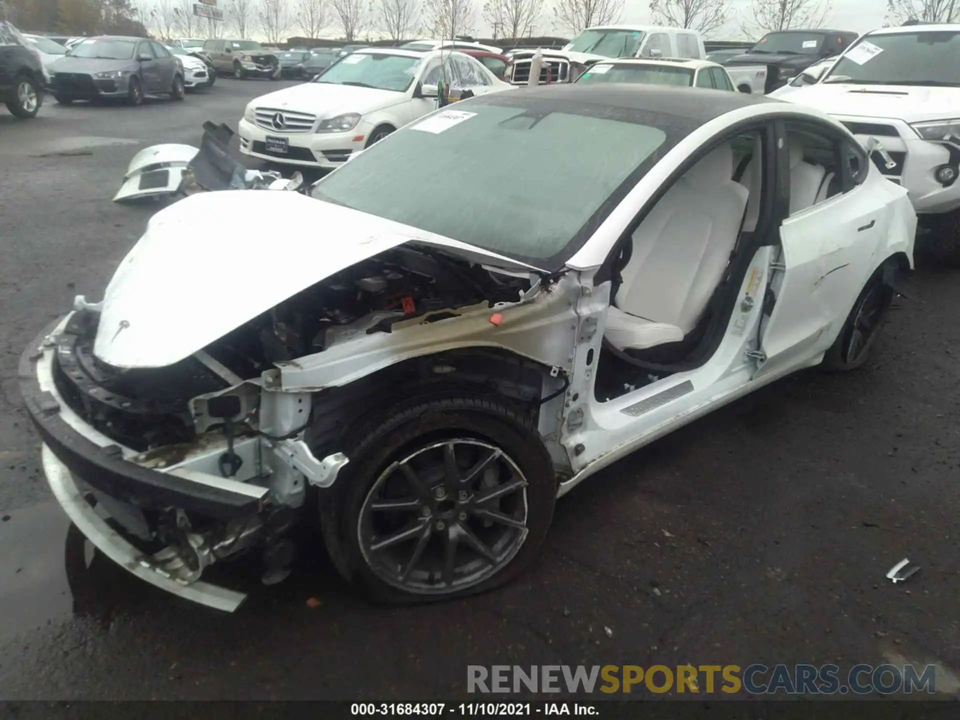 2 Photograph of a damaged car 5YJ3E1EA3LF599164 TESLA MODEL 3 2020